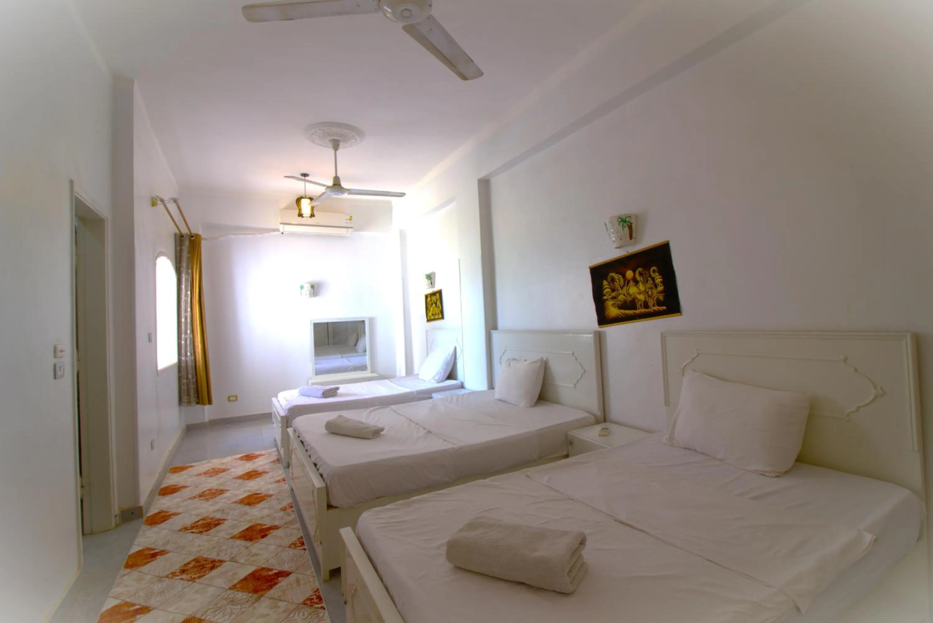 Bed in Mama Africa Apts & Studios