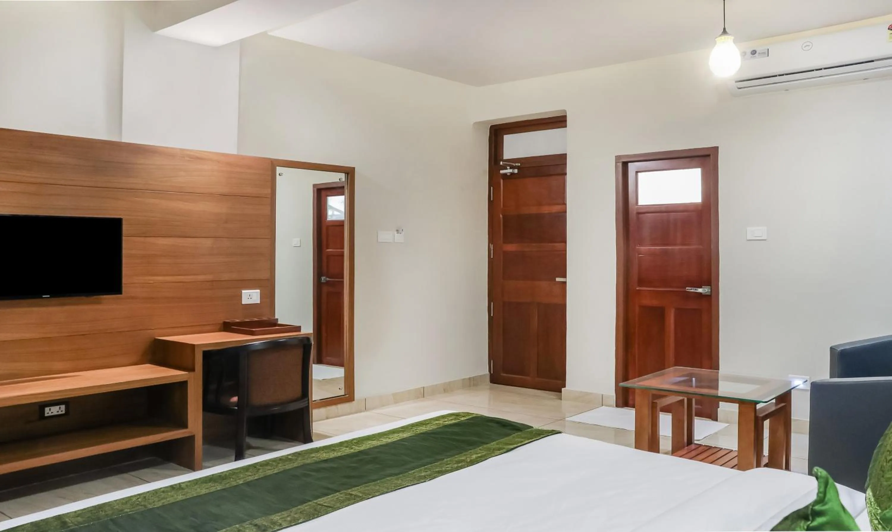 Bedroom in Treebo Casino