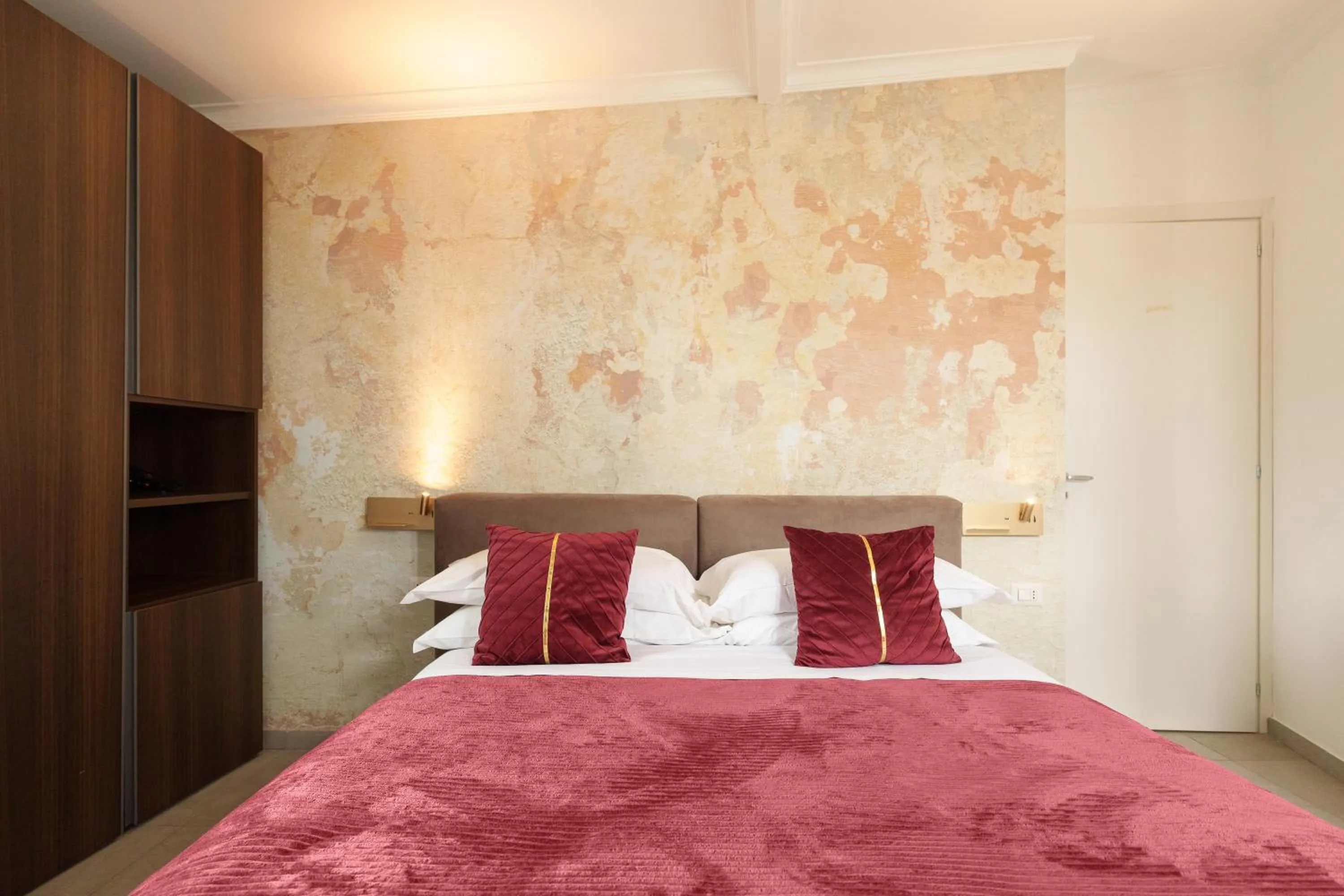 Bed in Ortigia Boutique Palace