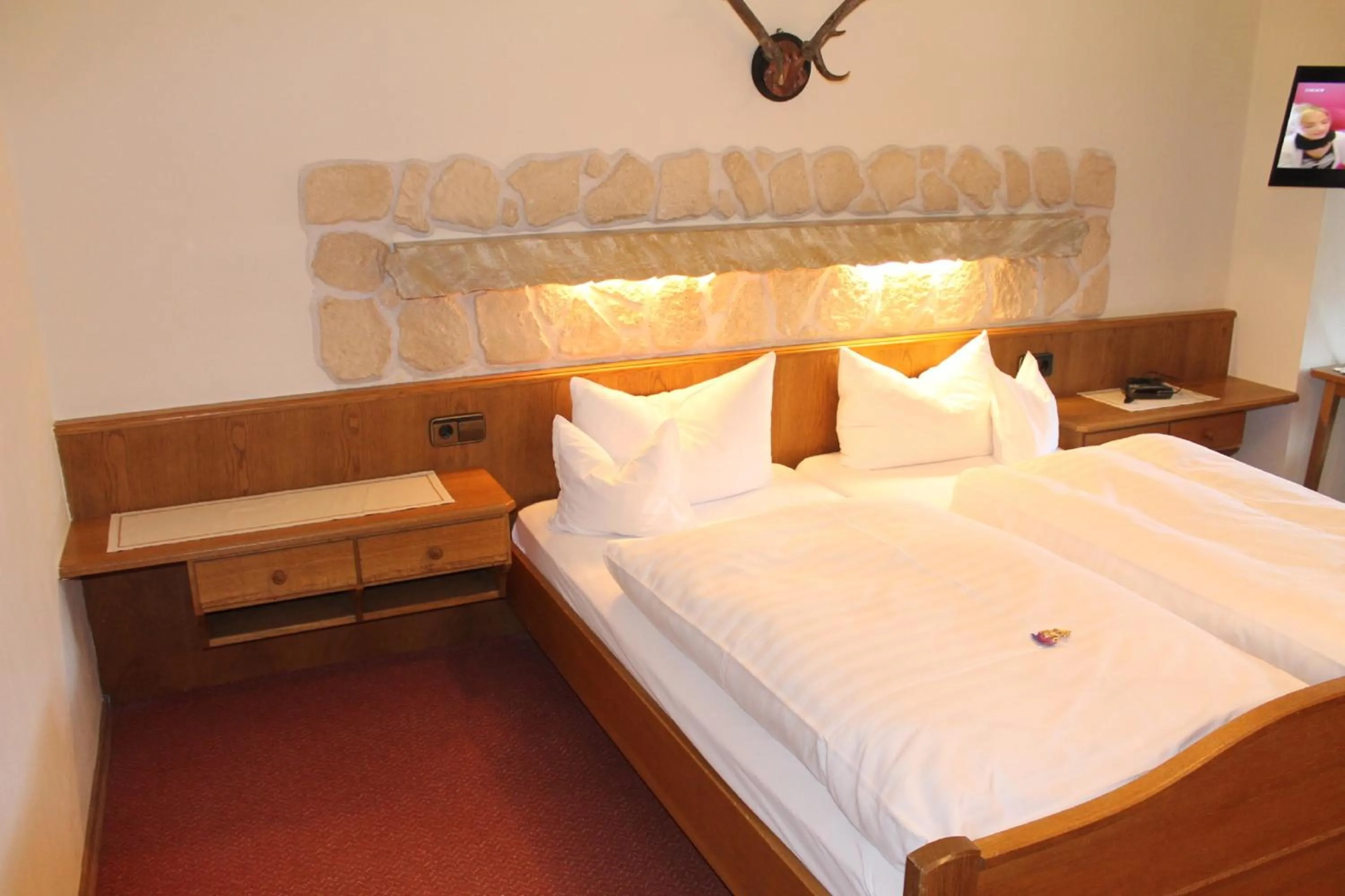 Photo of the whole room, Bed in DEVA Hotel-Restaurant Fischerwirt inklusive Chiemgau Card