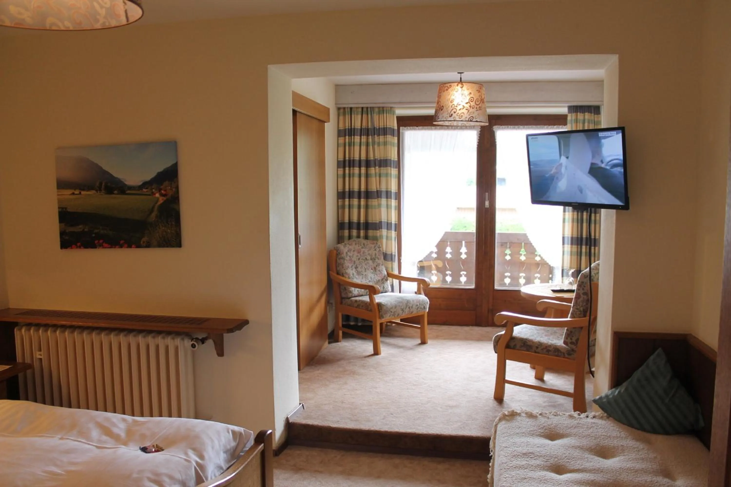 Photo of the whole room, Bed in DEVA Hotel-Restaurant Fischerwirt inklusive Chiemgau Card