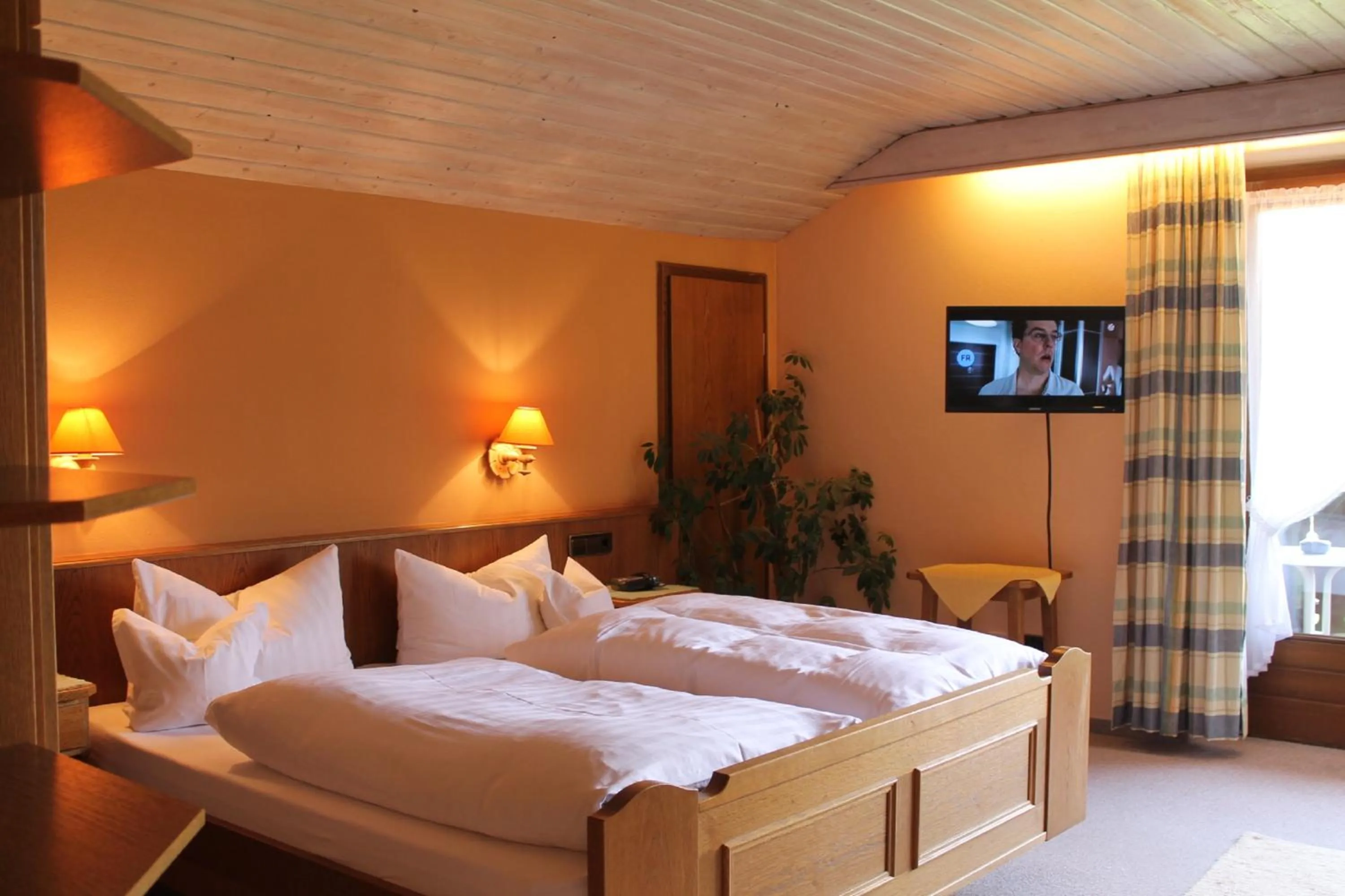 Photo of the whole room, Bed in DEVA Hotel-Restaurant Fischerwirt inklusive Chiemgau Card