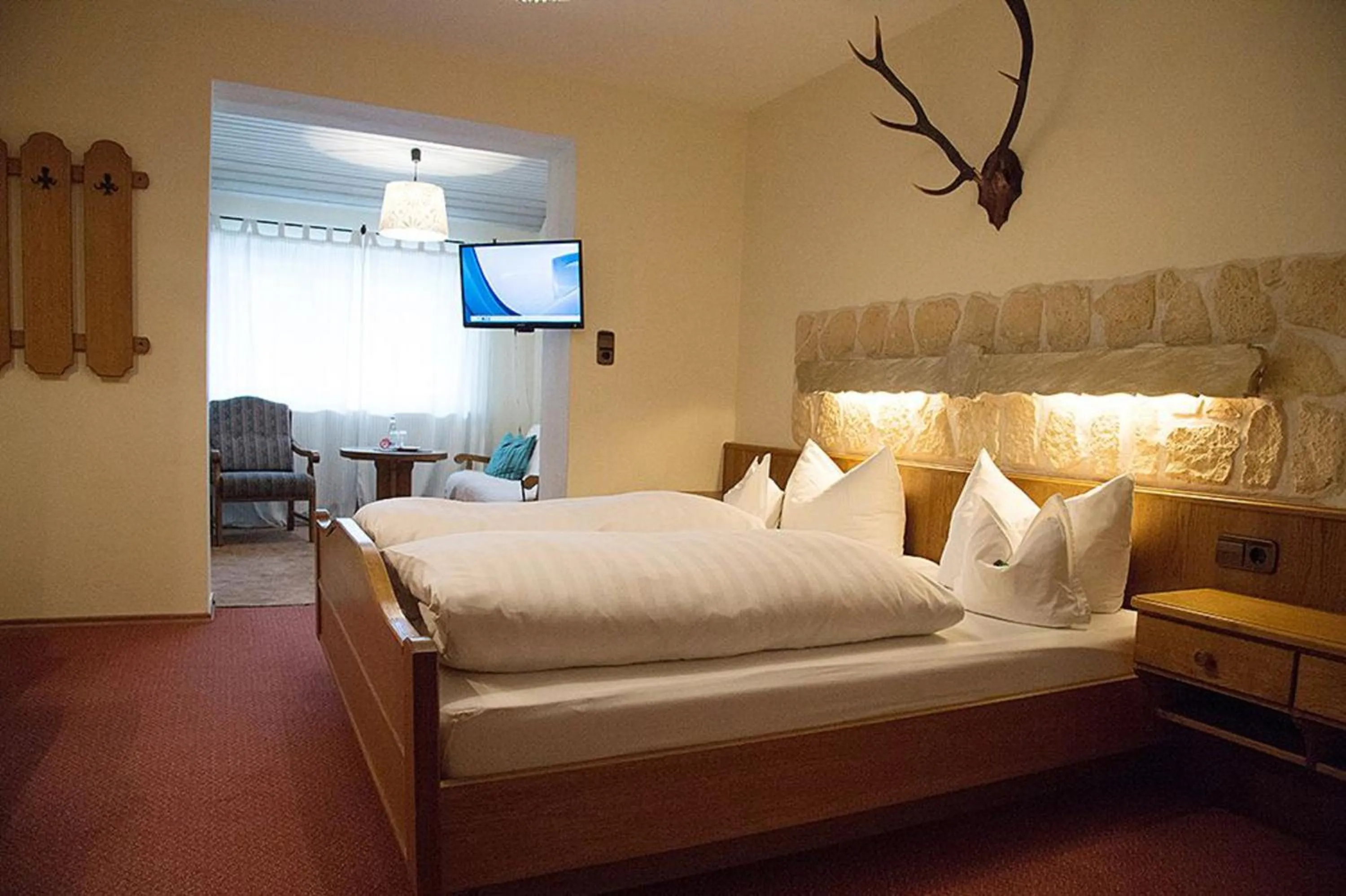 Photo of the whole room, Bed in DEVA Hotel-Restaurant Fischerwirt inklusive Chiemgau Card