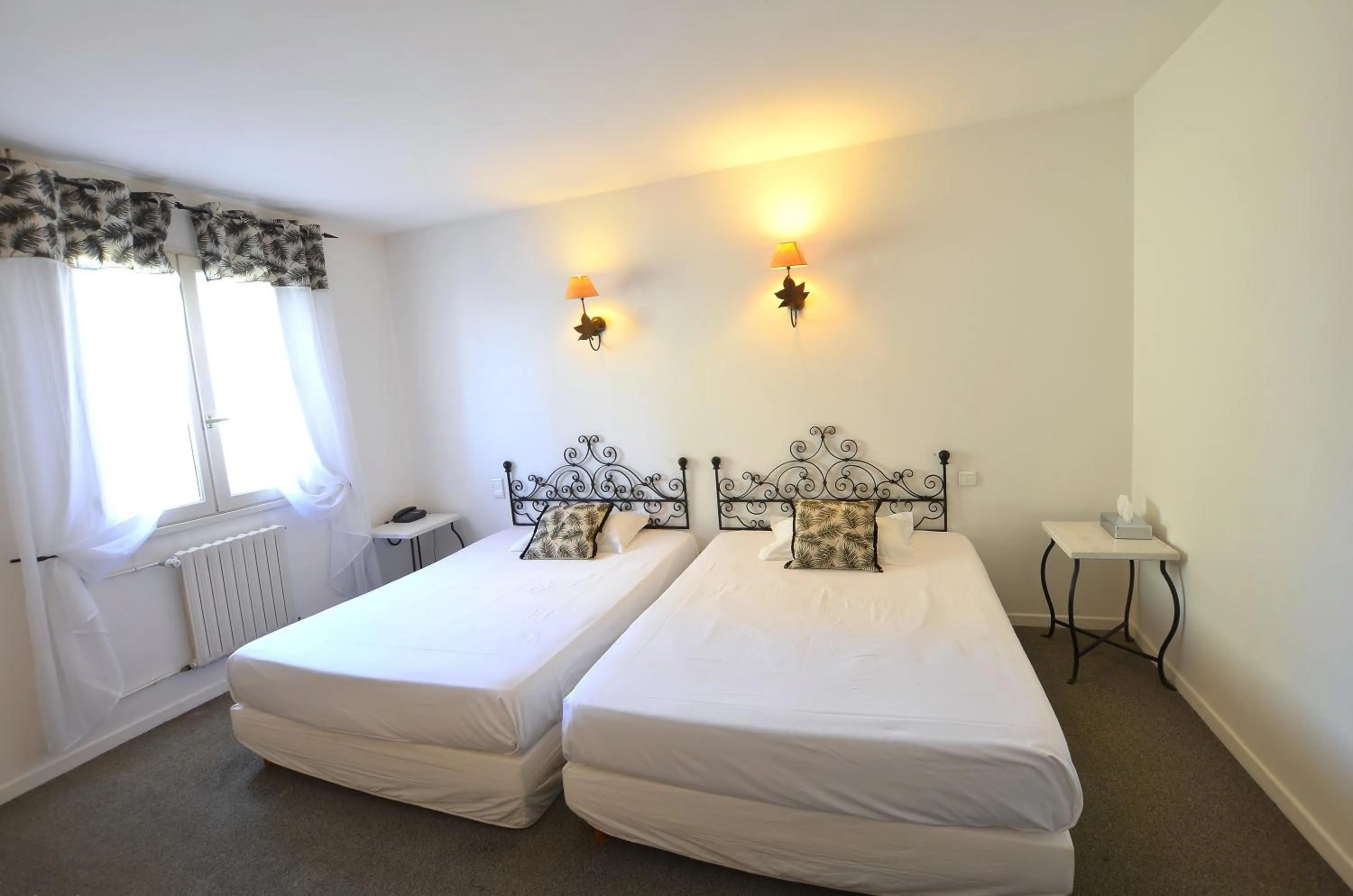 Bedroom, Bed in Logis Hôtels - Hôtel Restaurant du Midi