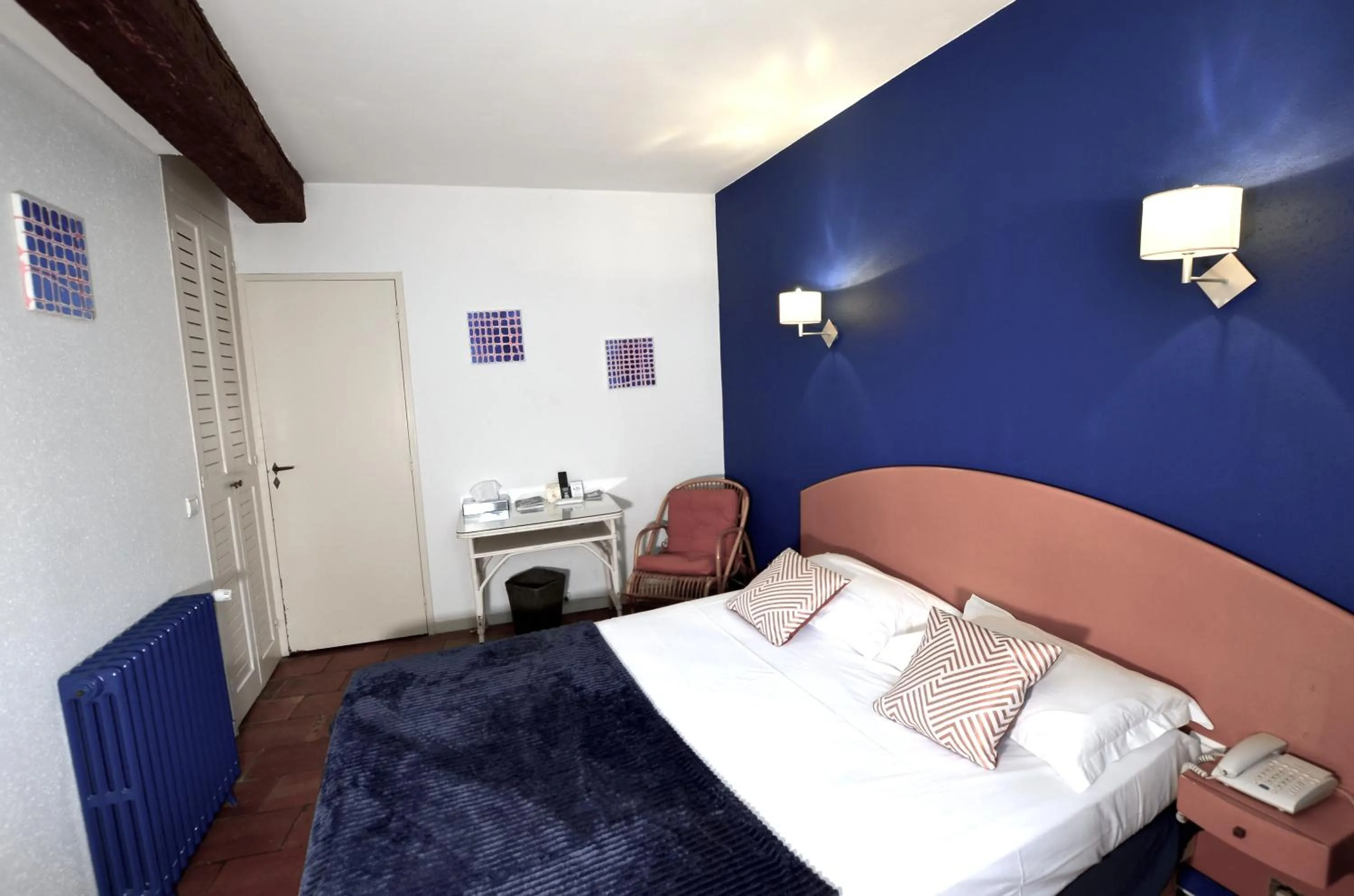 Bedroom, Bed in Logis Hôtels - Hôtel Restaurant du Midi