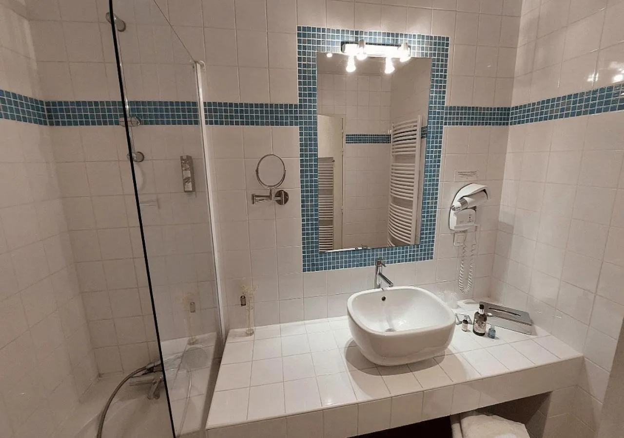 Bathroom in Logis Hôtels - Hôtel Restaurant du Midi