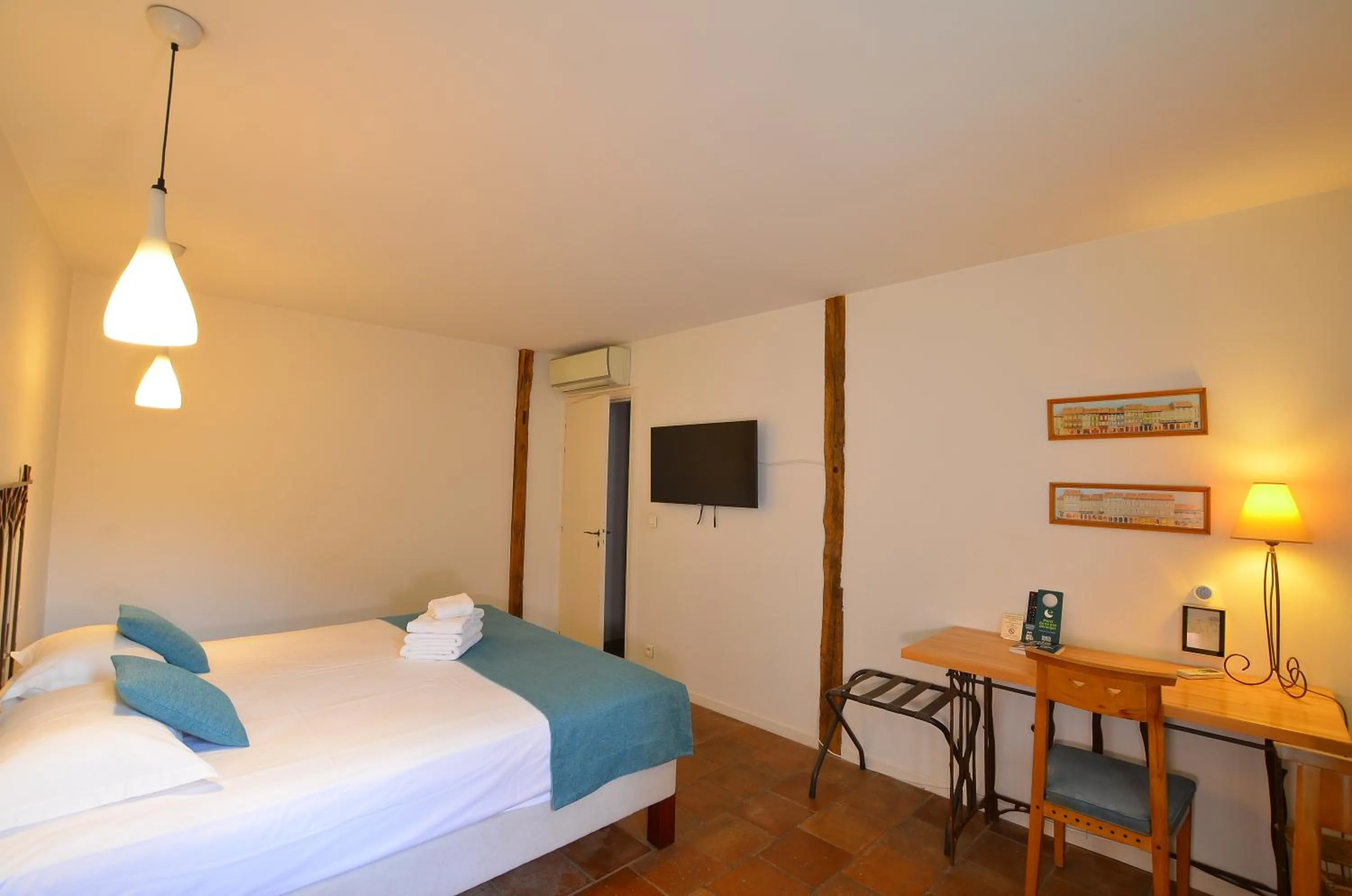 Bedroom, Bed in Logis Hôtels - Hôtel Restaurant du Midi