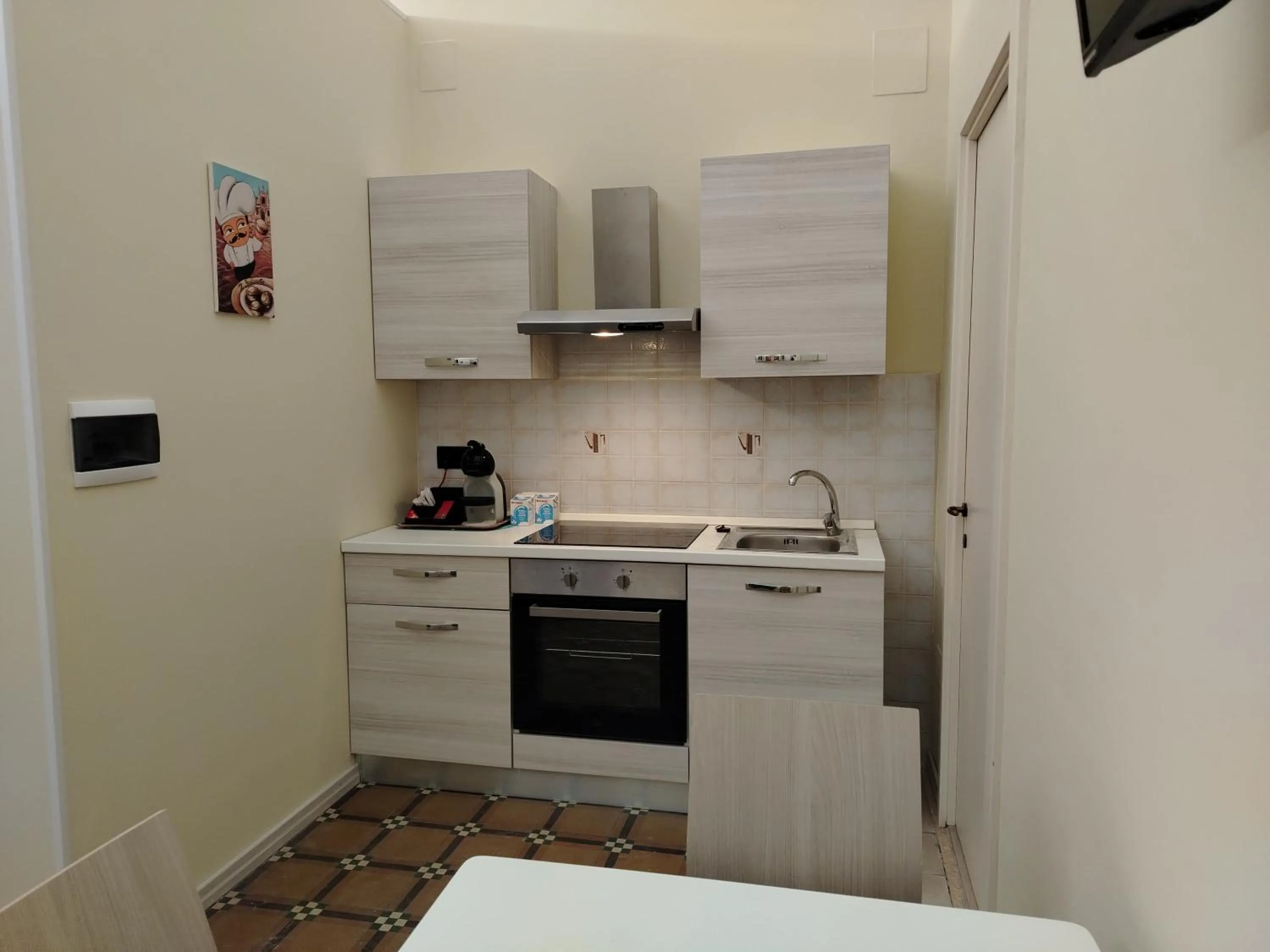 Kitchen or kitchenette in iLCastellano - Suites & Apartments