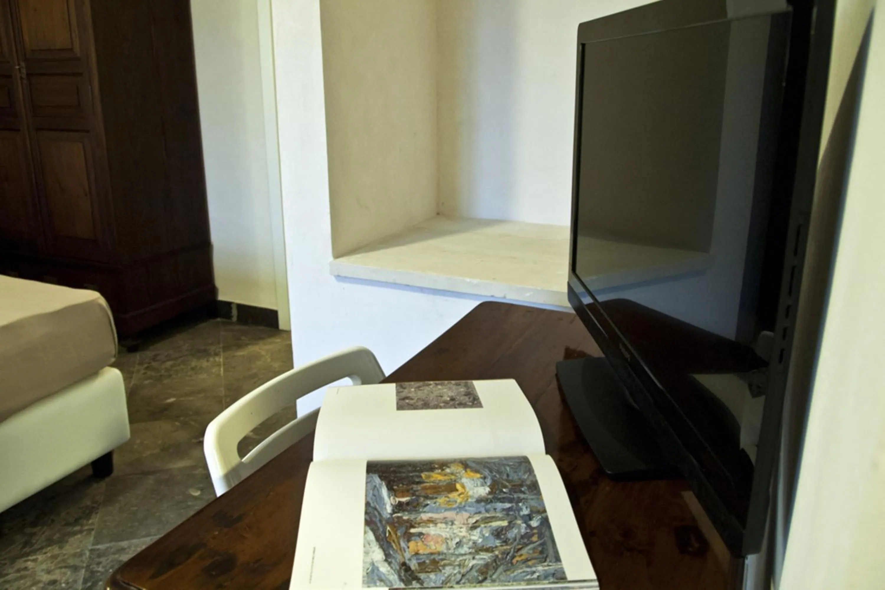 Decorative detail, Bed in Hotel Dell'Orologio