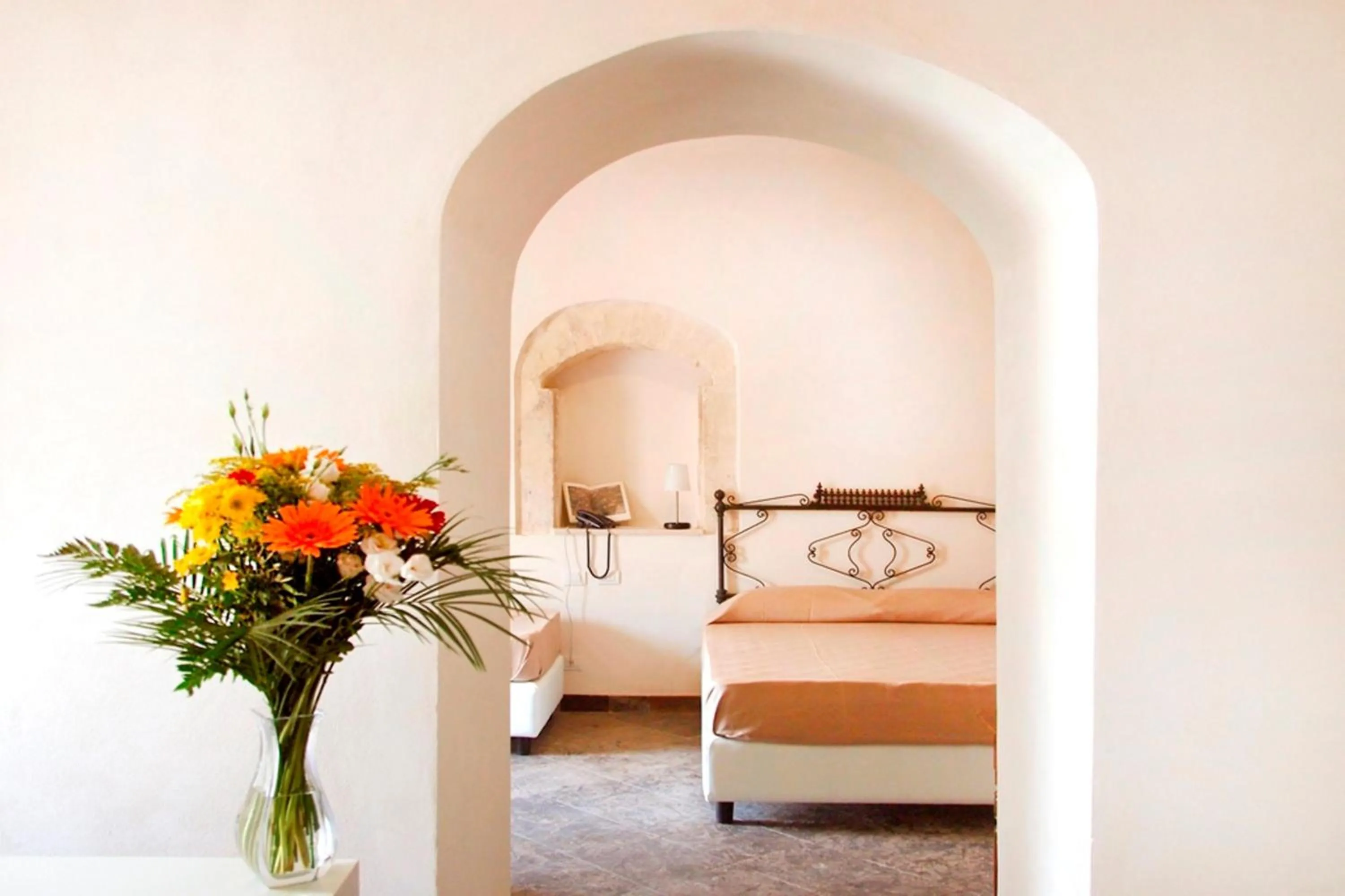 Decorative detail, Bed in Hotel Dell'Orologio