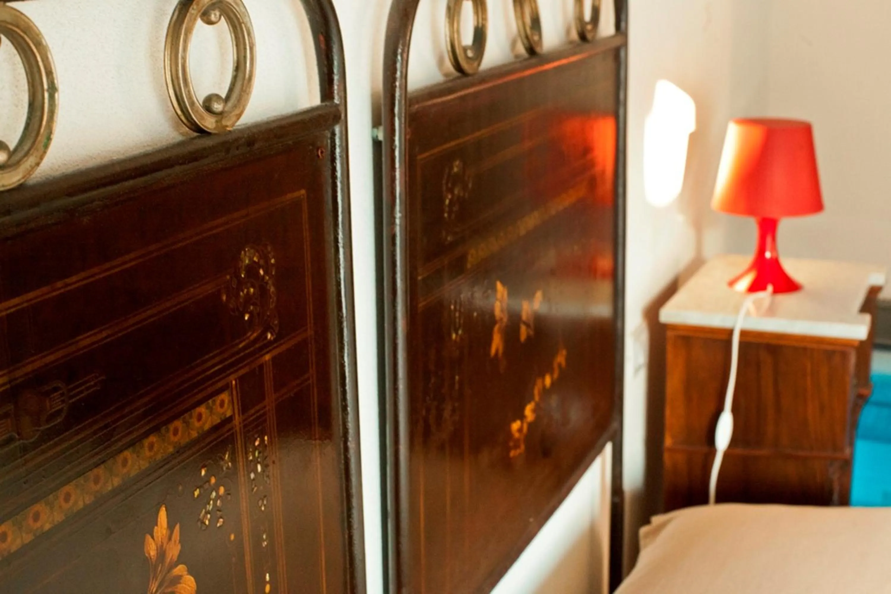 Decorative detail, Bed in Hotel Dell'Orologio