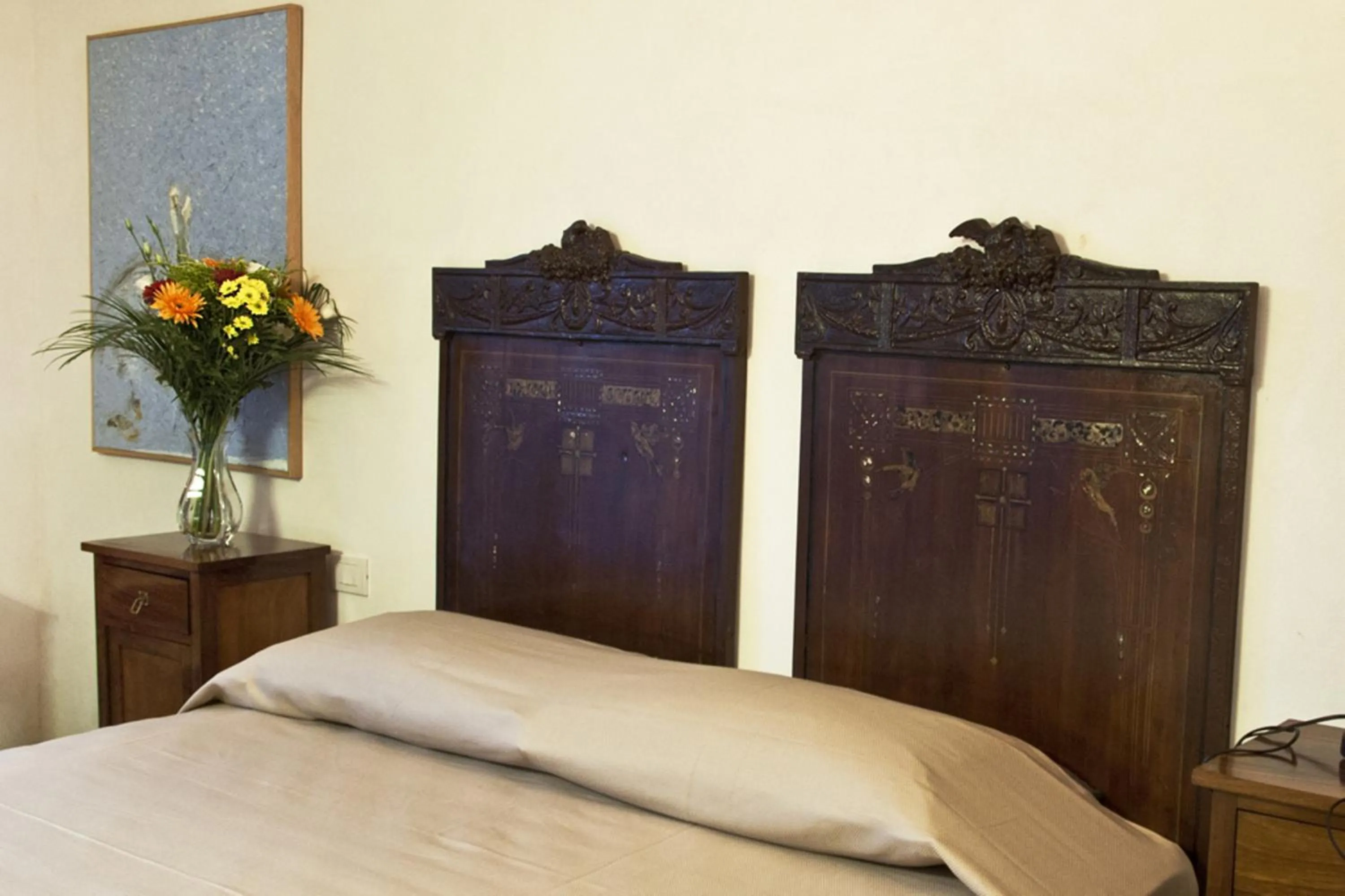 Decorative detail, Bed in Hotel Dell'Orologio