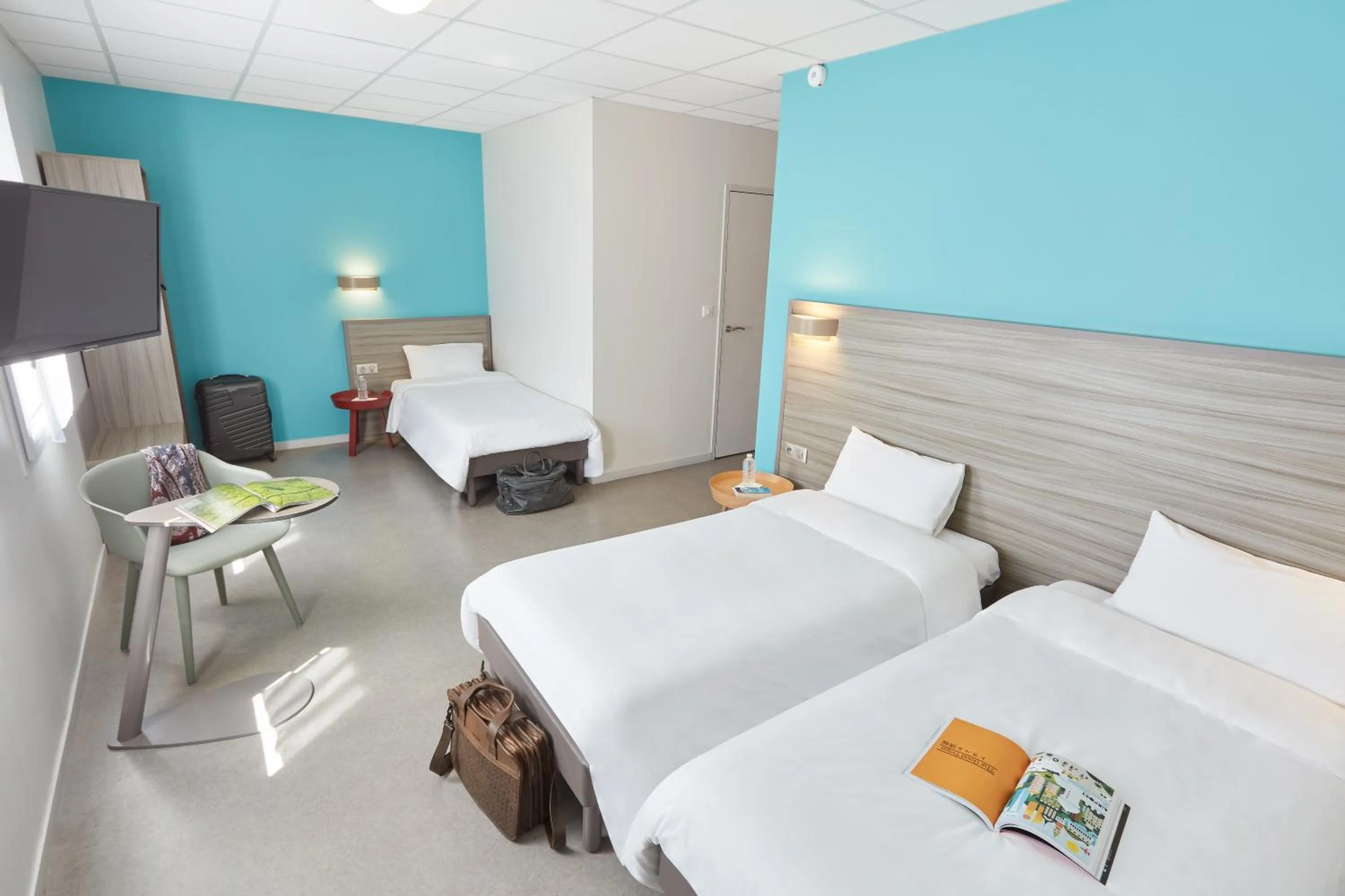 Bed in Ashley Hotel Le Mans Sud