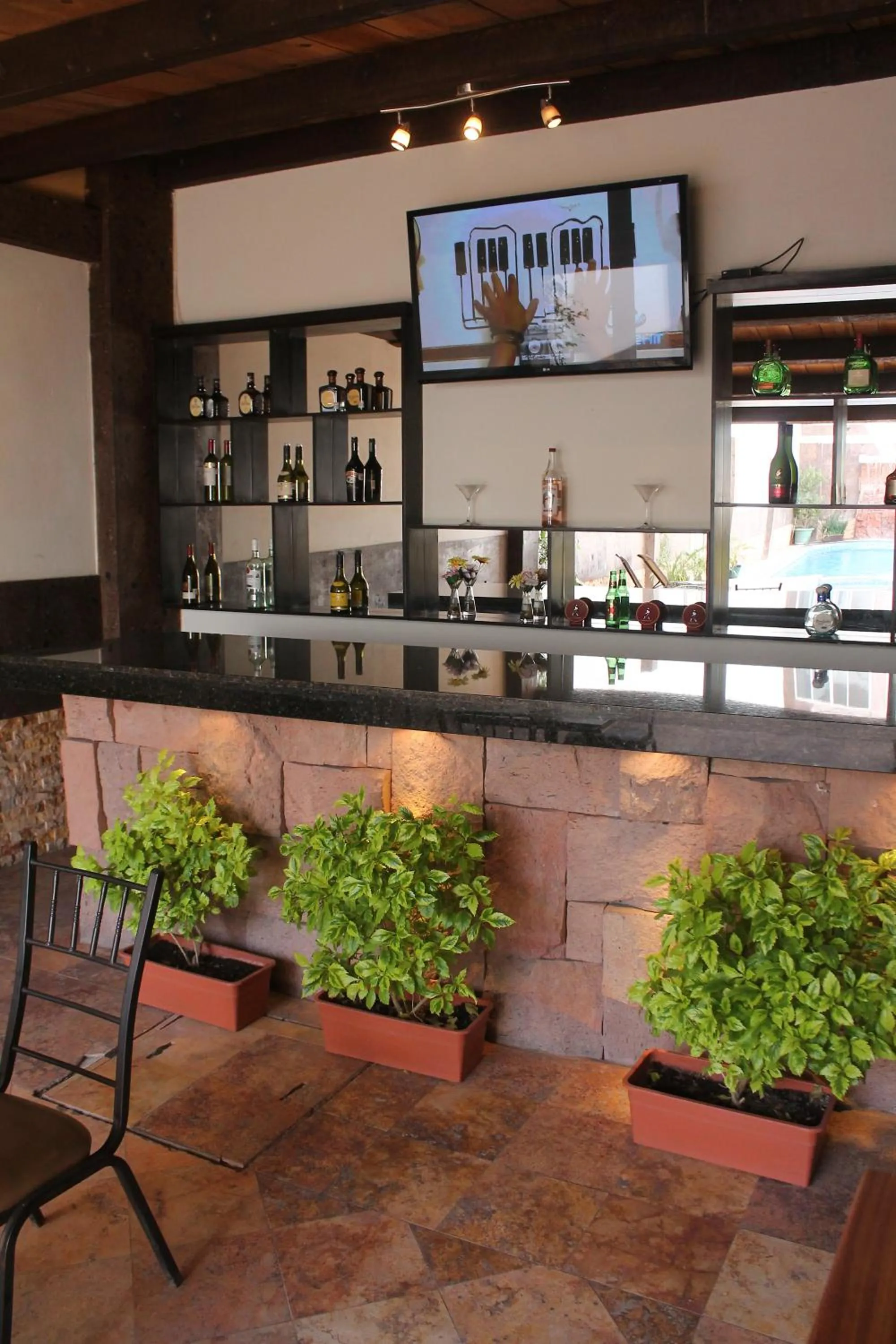 Lounge or bar in Hotel Rincon Real Suites