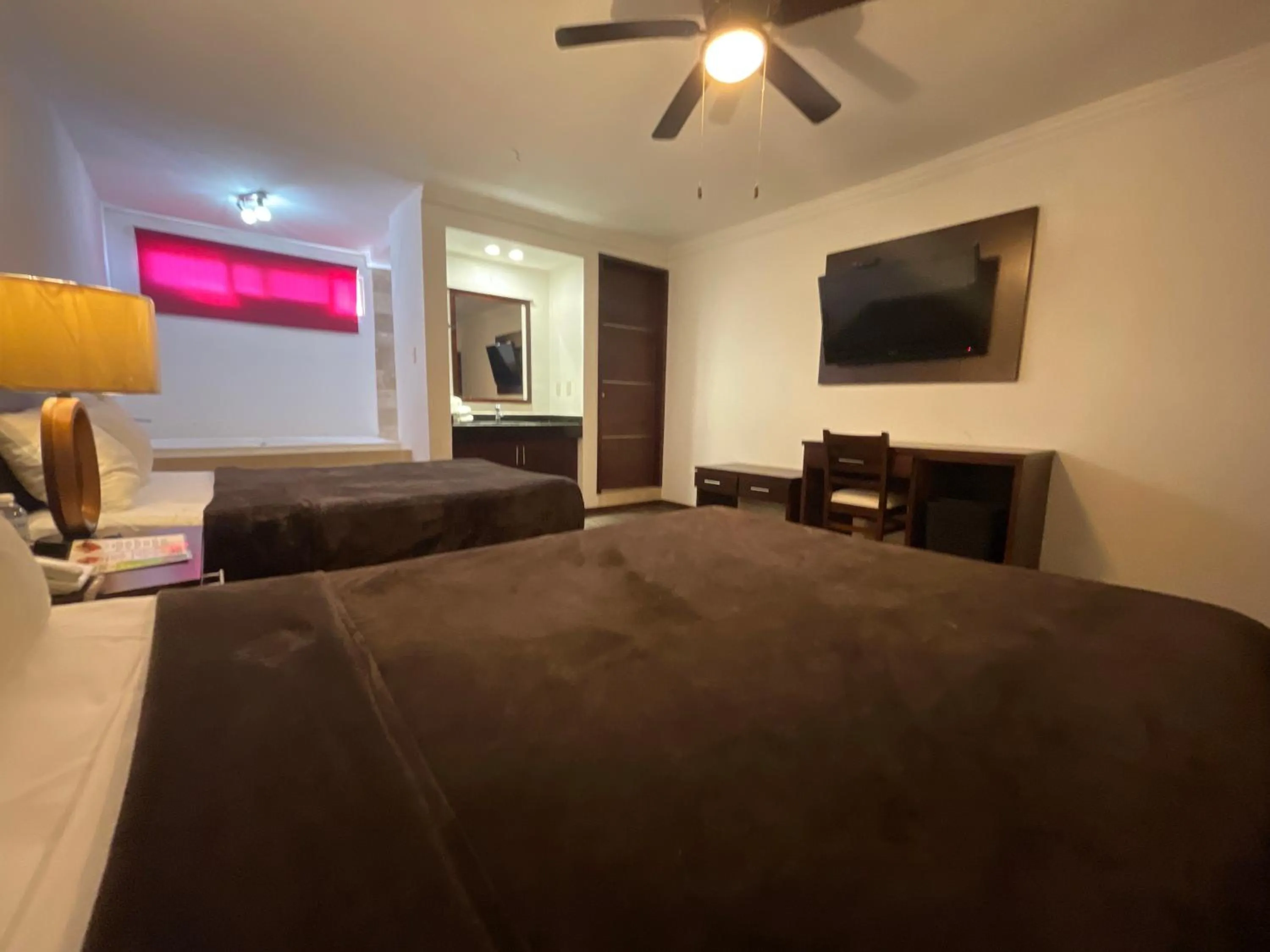 Bed in Hotel Rincon Real Suites