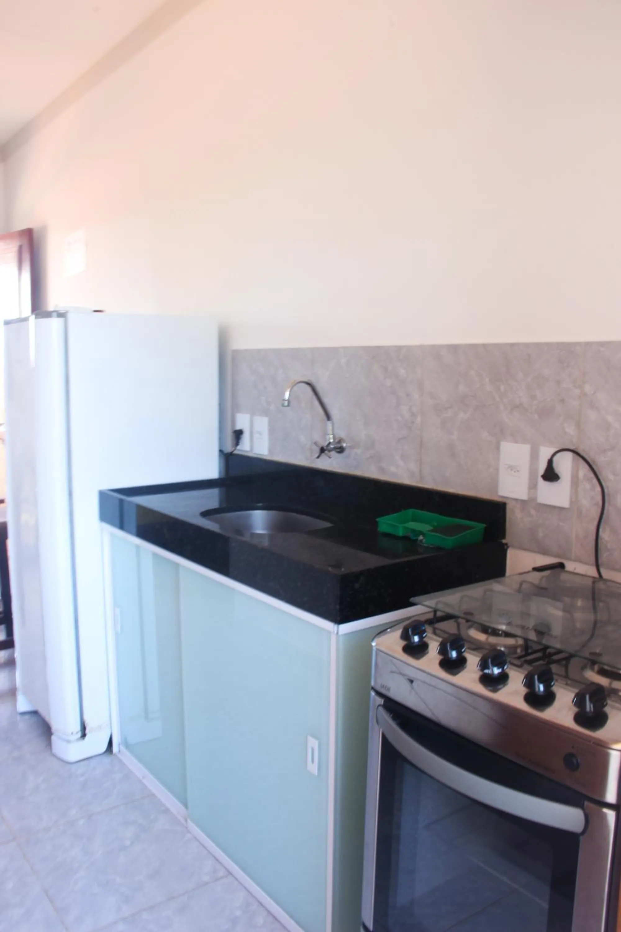 Kitchen or kitchenette in Flat's Portal do Sol-SMG