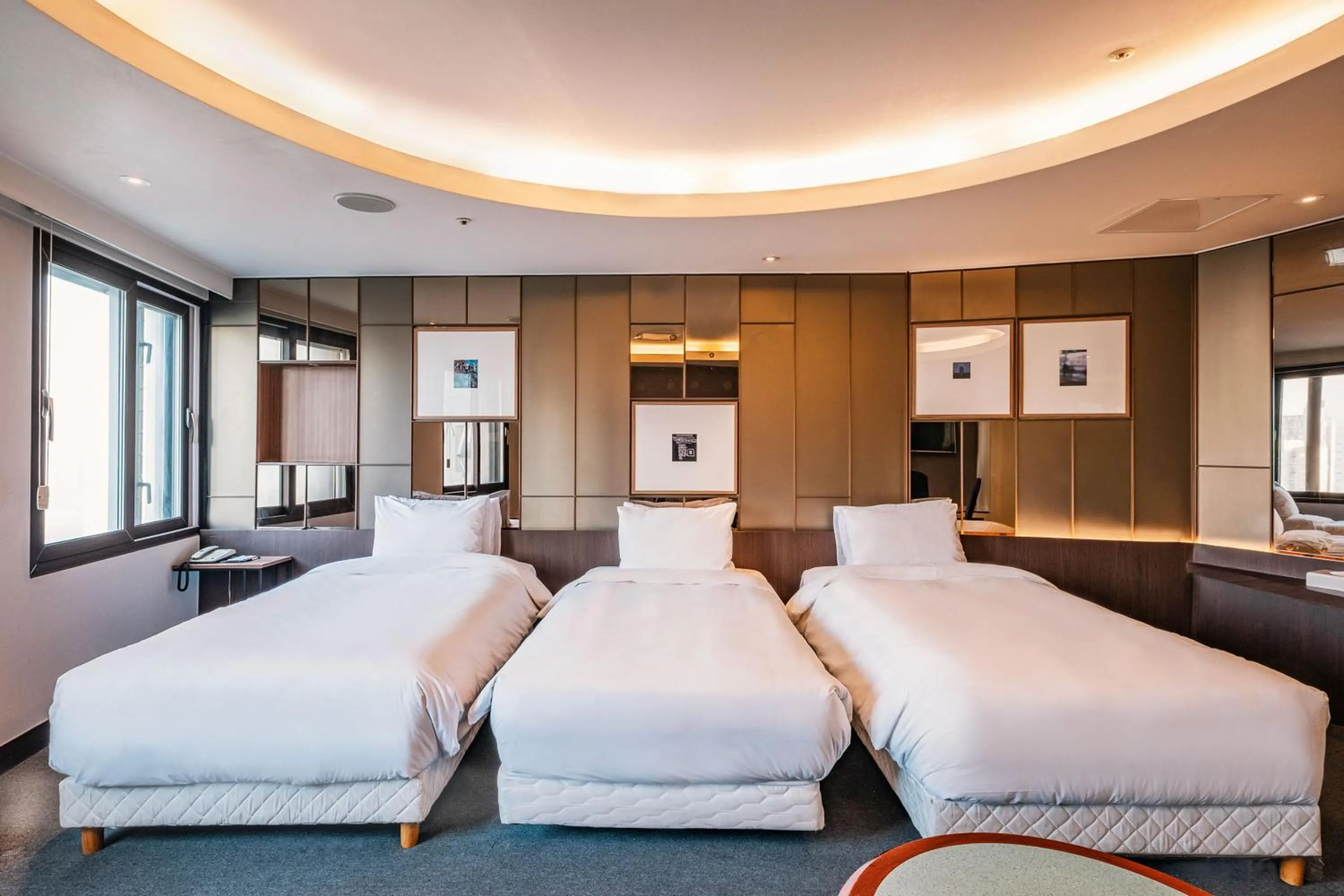 Bed in The Riverside Hotel