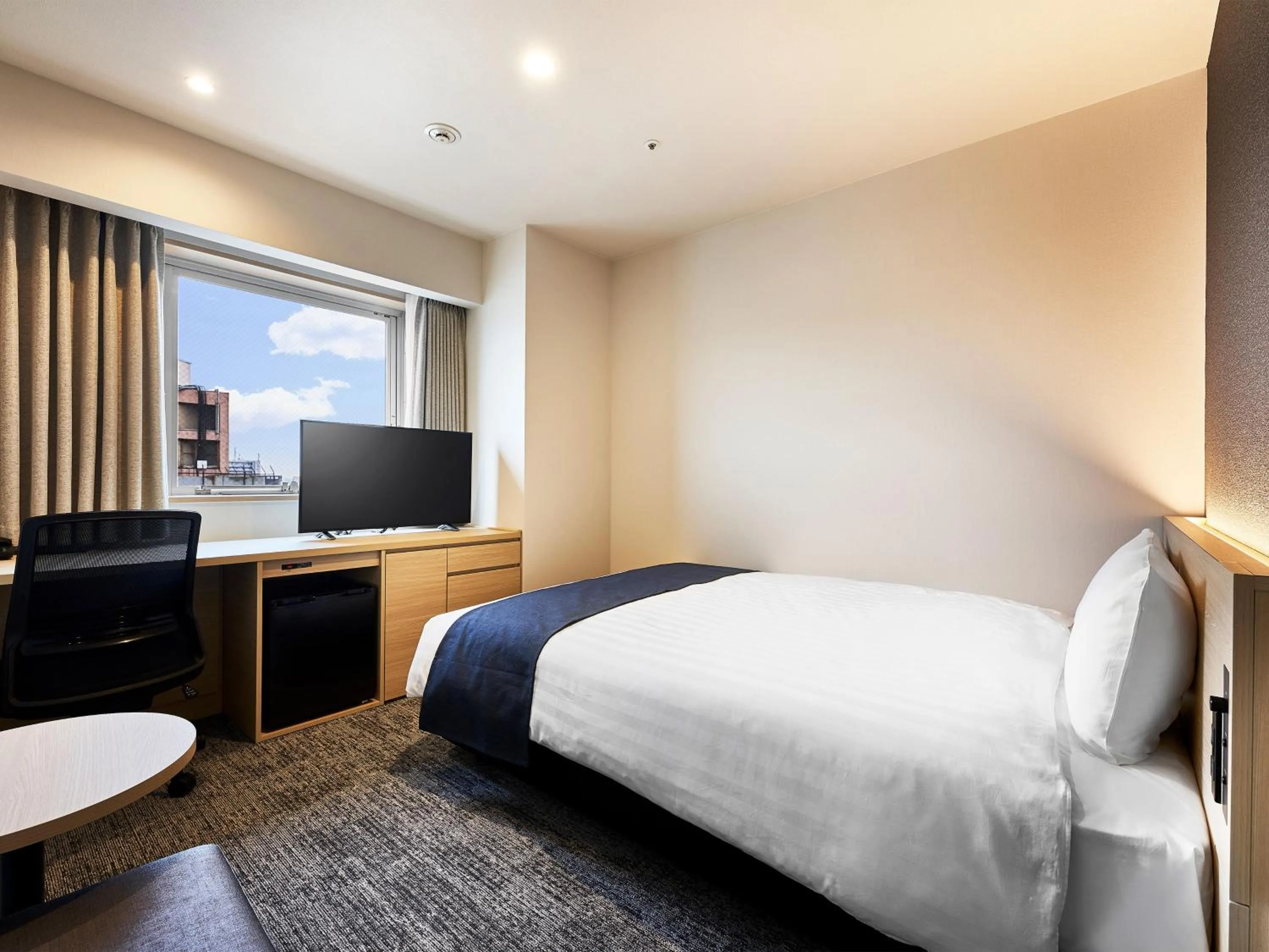 Bed in Daiwa Roynet Hotel Gifu