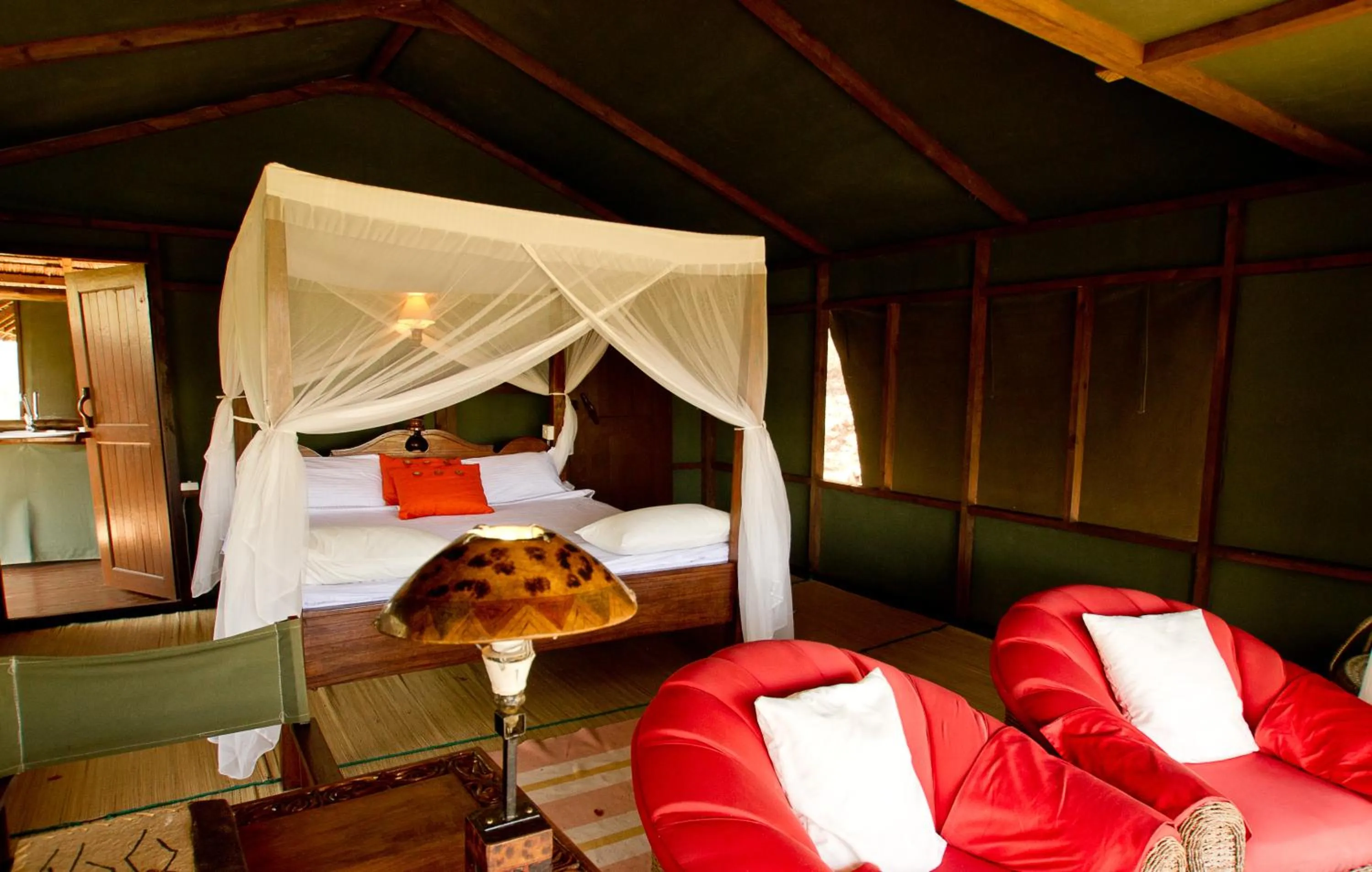 Bed in Sable Mountain Lodge, A Tent with a View Safaris