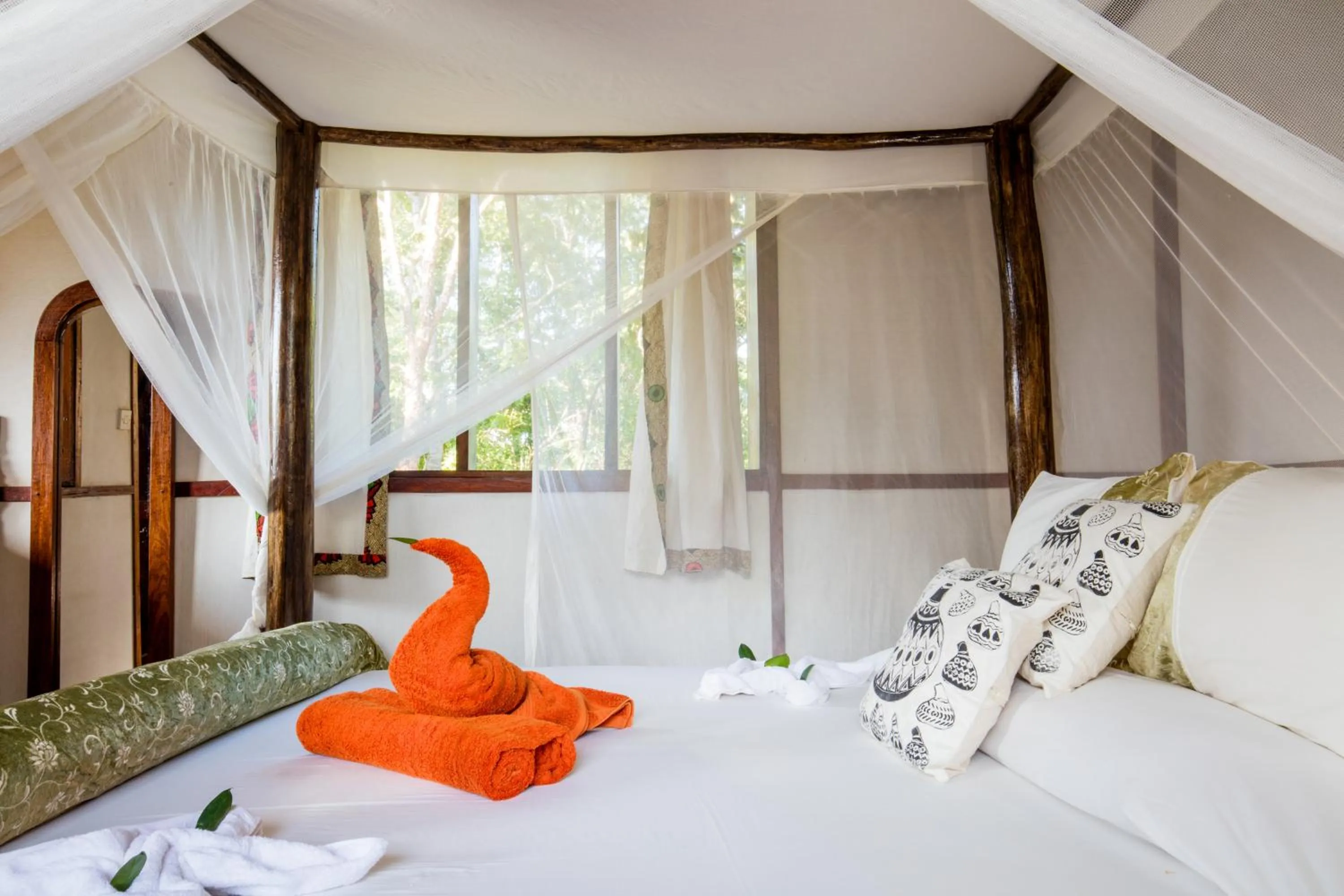 Property building, Bed in Sable Mountain Lodge, A Tent with a View Safaris