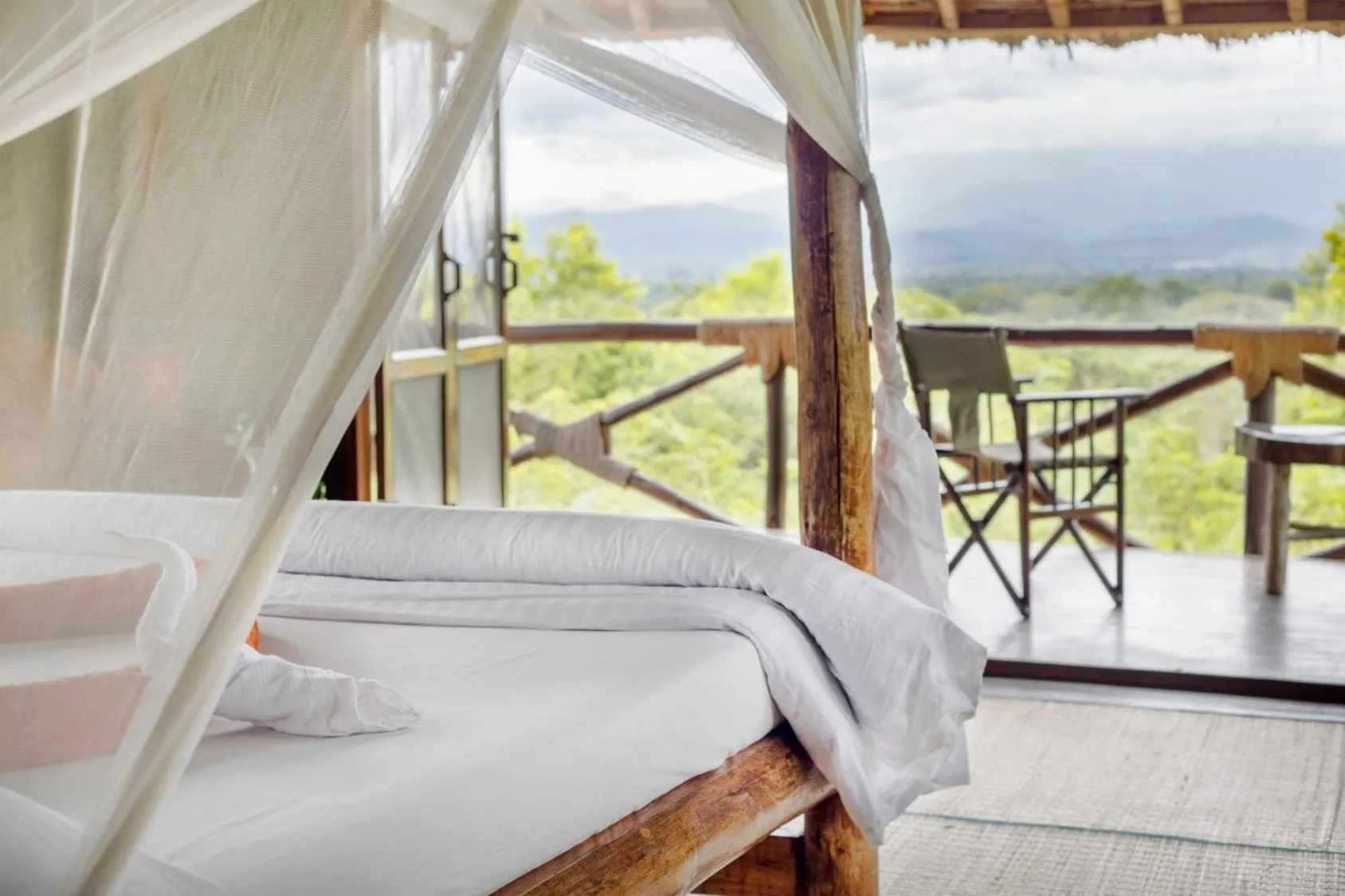 Property building, Bed in Sable Mountain Lodge, A Tent with a View Safaris