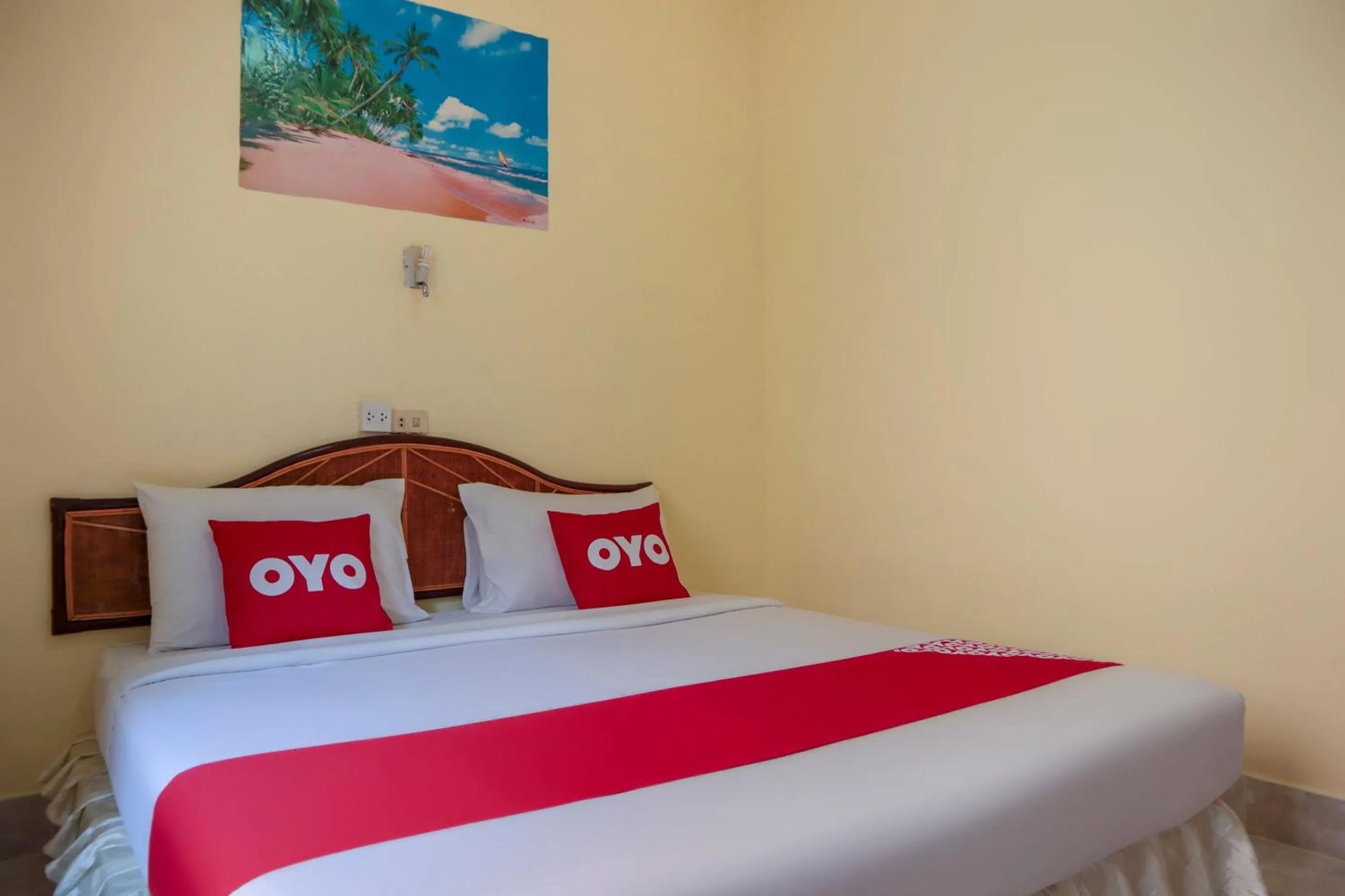 Bedroom in OYO 681 Paradise Hotel