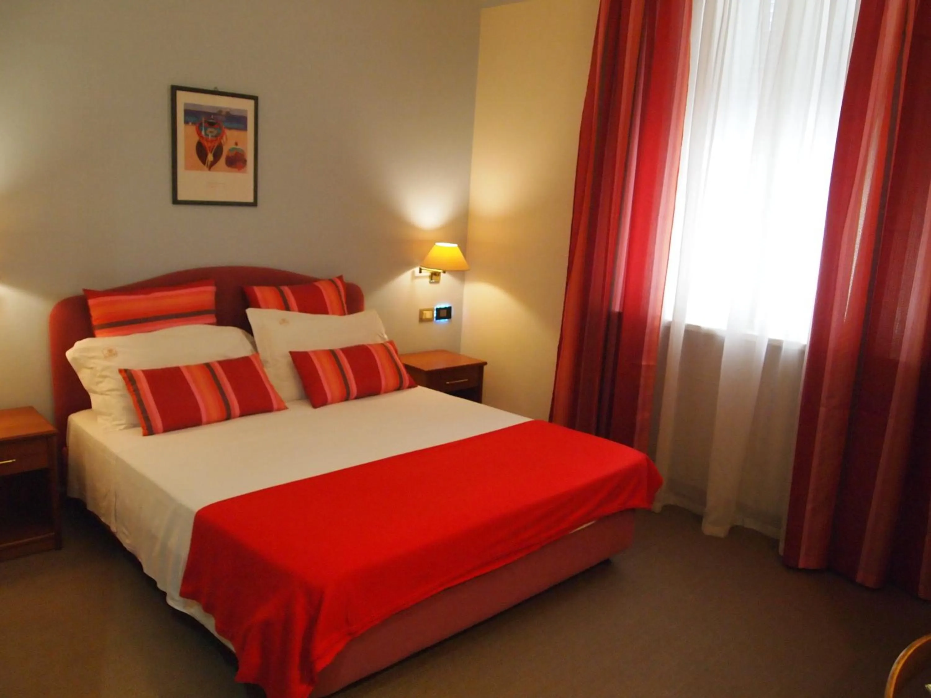 Bed in Piccolo Hotel