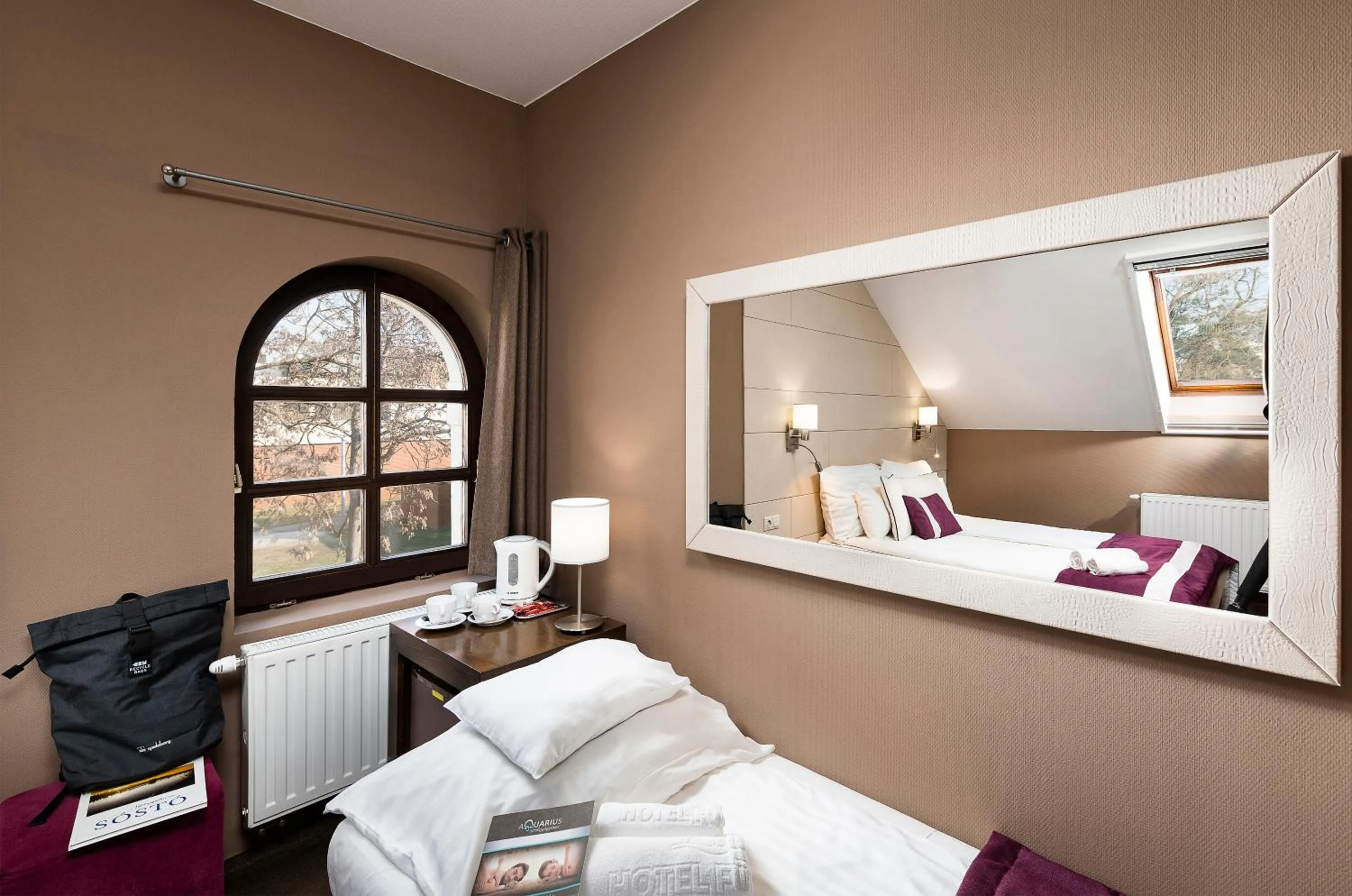 Bed in Hotel Fürdőház