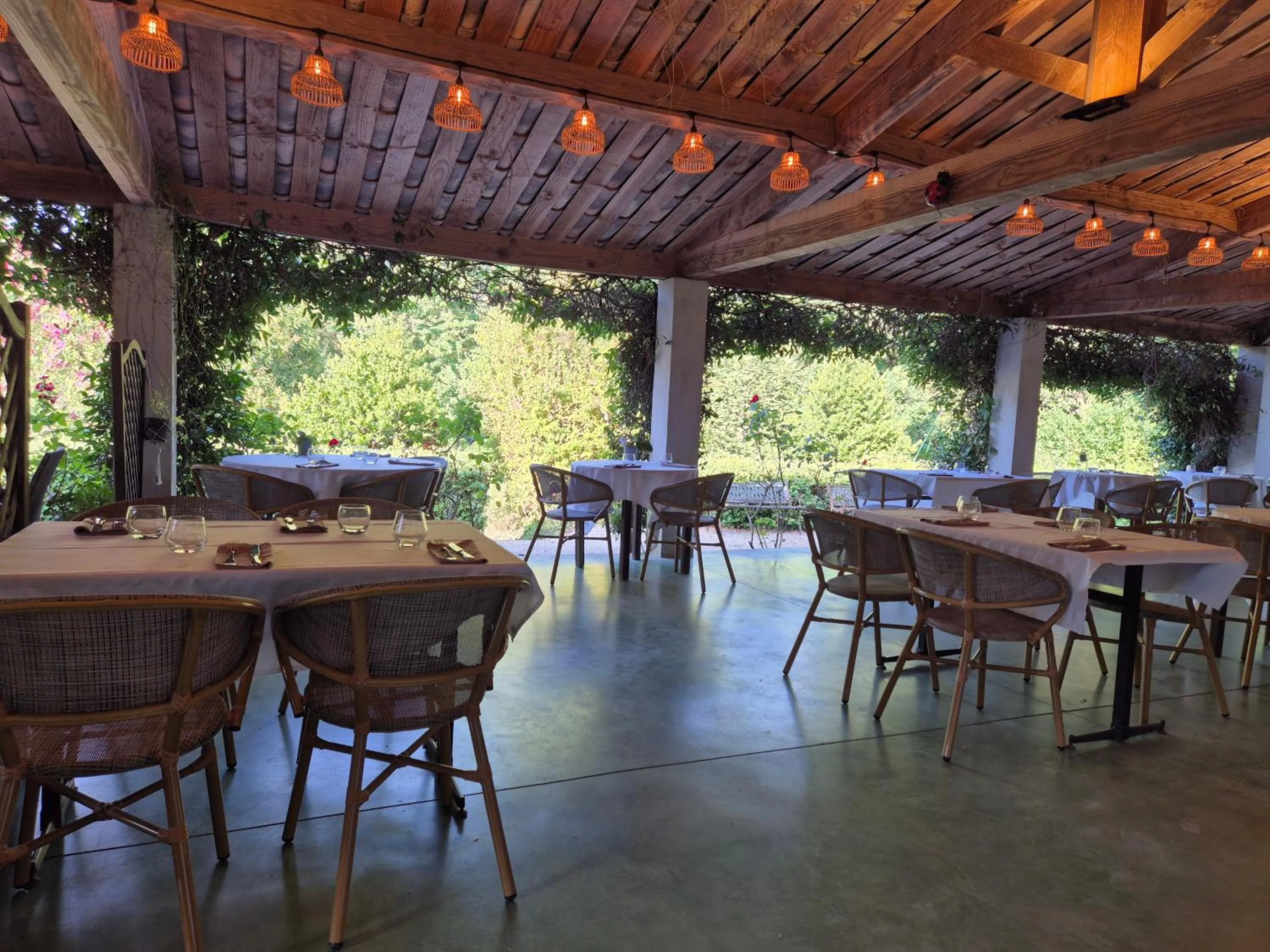 Patio in Logis Hôtel Restaurant Les Norias