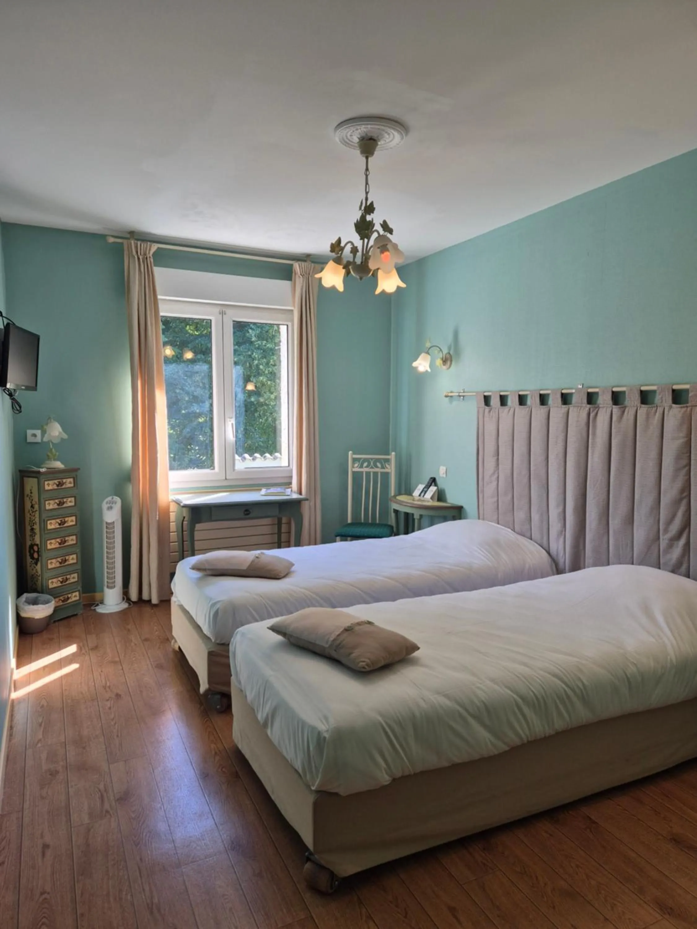 Bed in Logis Hôtel Restaurant Les Norias