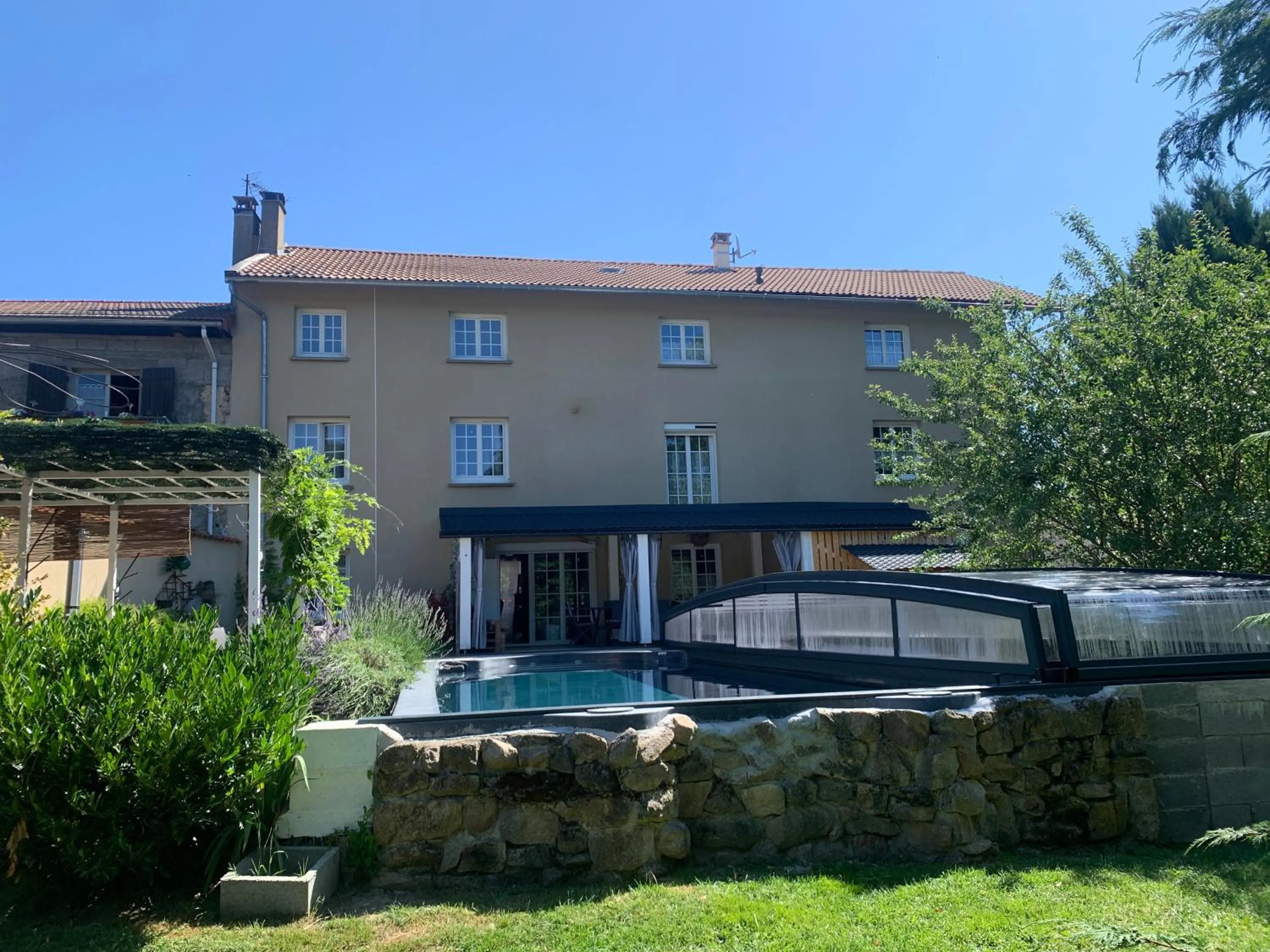 Swimming pool in Chambres d'Hôtes LES VERGERS DE LOUISE