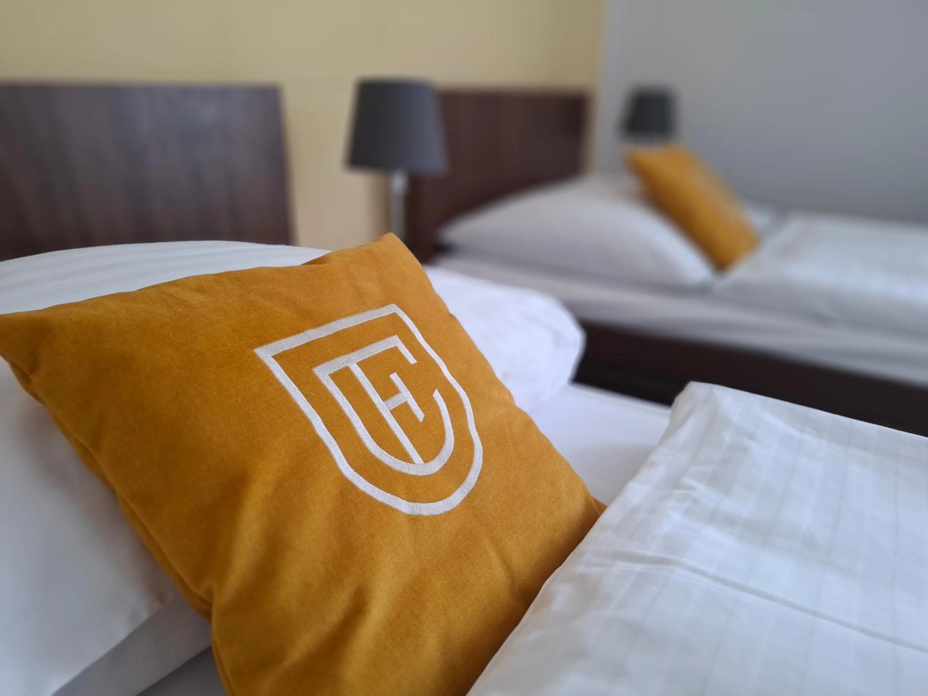 Property logo or sign, Bed in Hotel Eminent