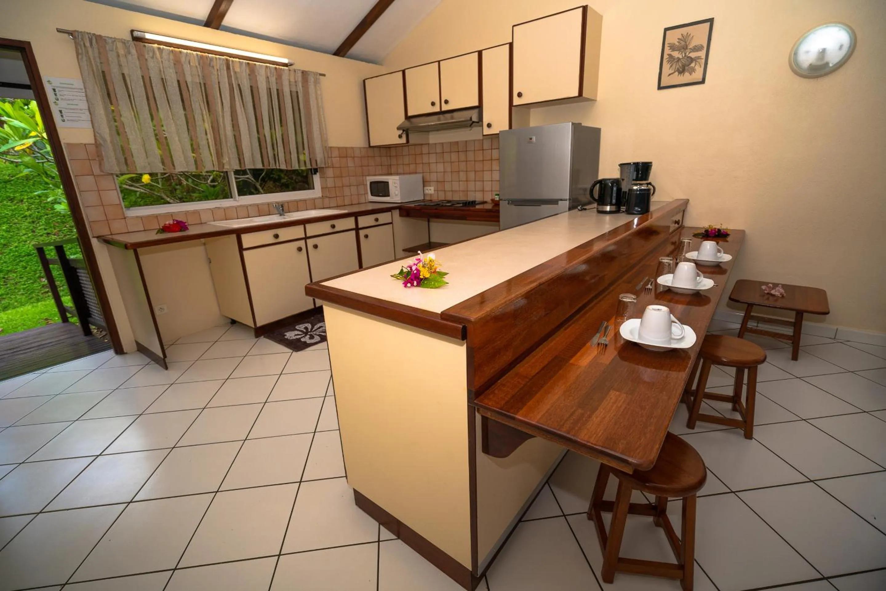 Kitchen or kitchenette in BORA BORA HOLIDAY'S LODGE