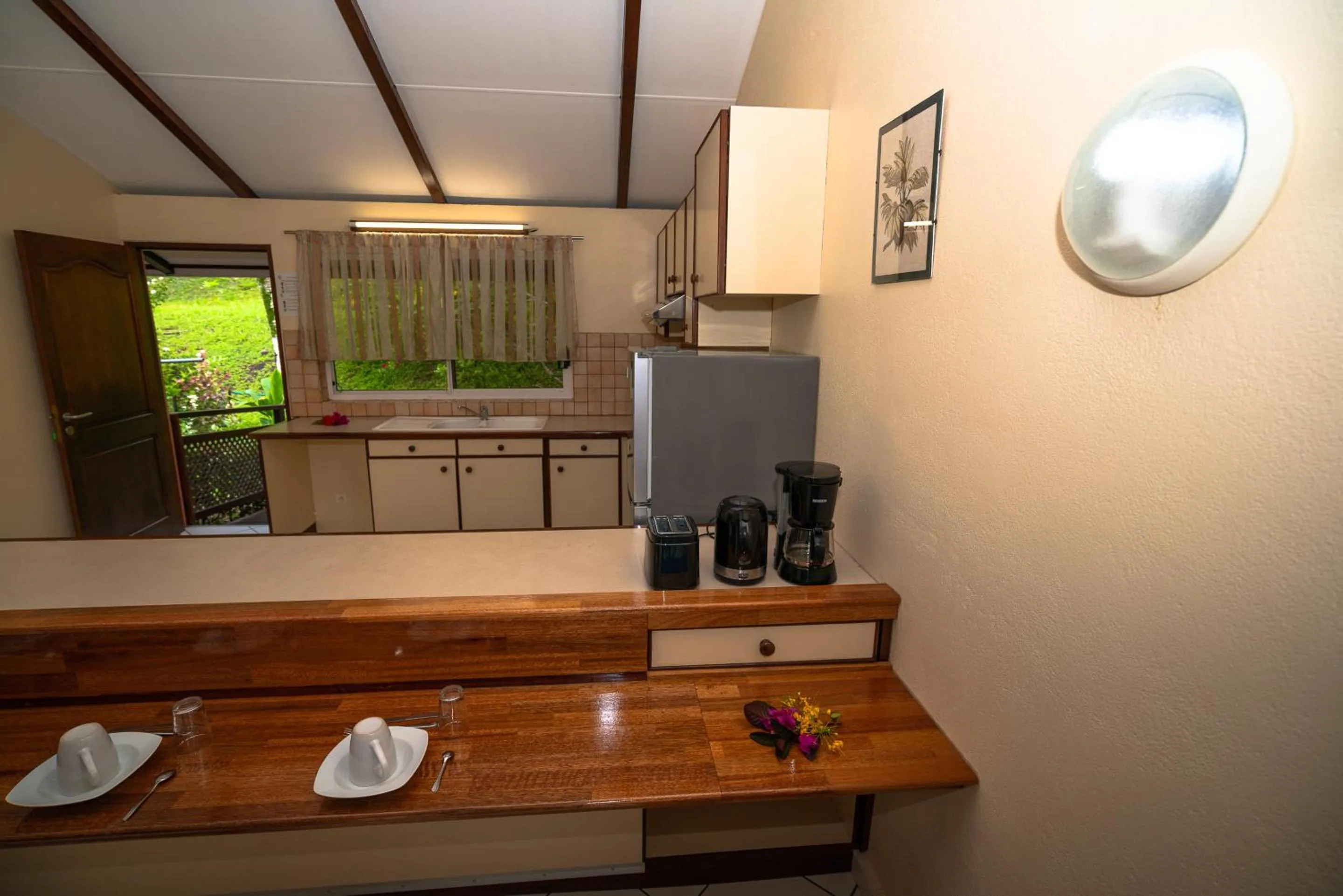Kitchen or kitchenette in BORA BORA HOLIDAY'S LODGE