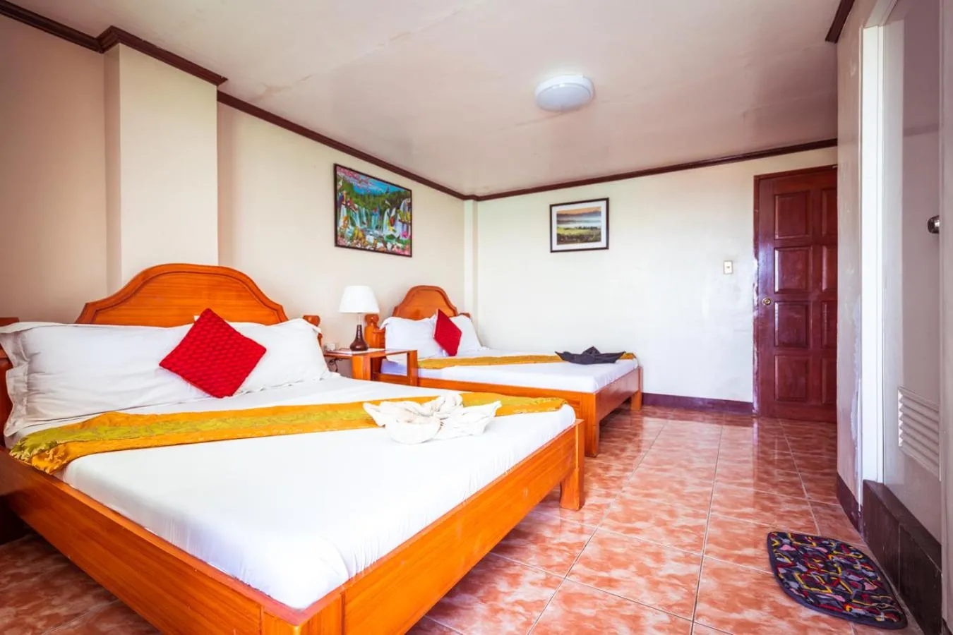 Bed in Blue Corals Beach Resort