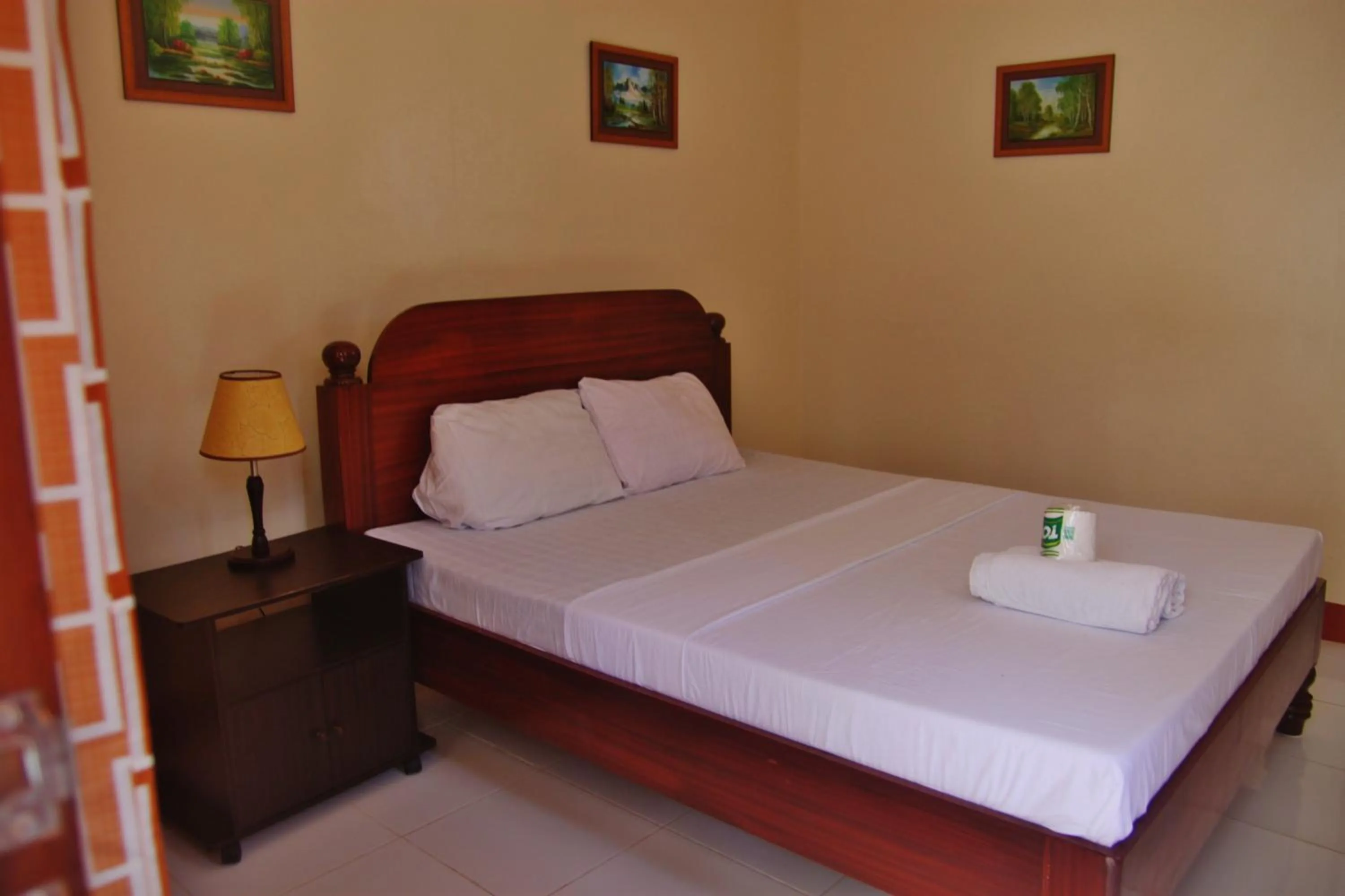 Photo of the whole room, Bed in Blue Corals Beach Resort