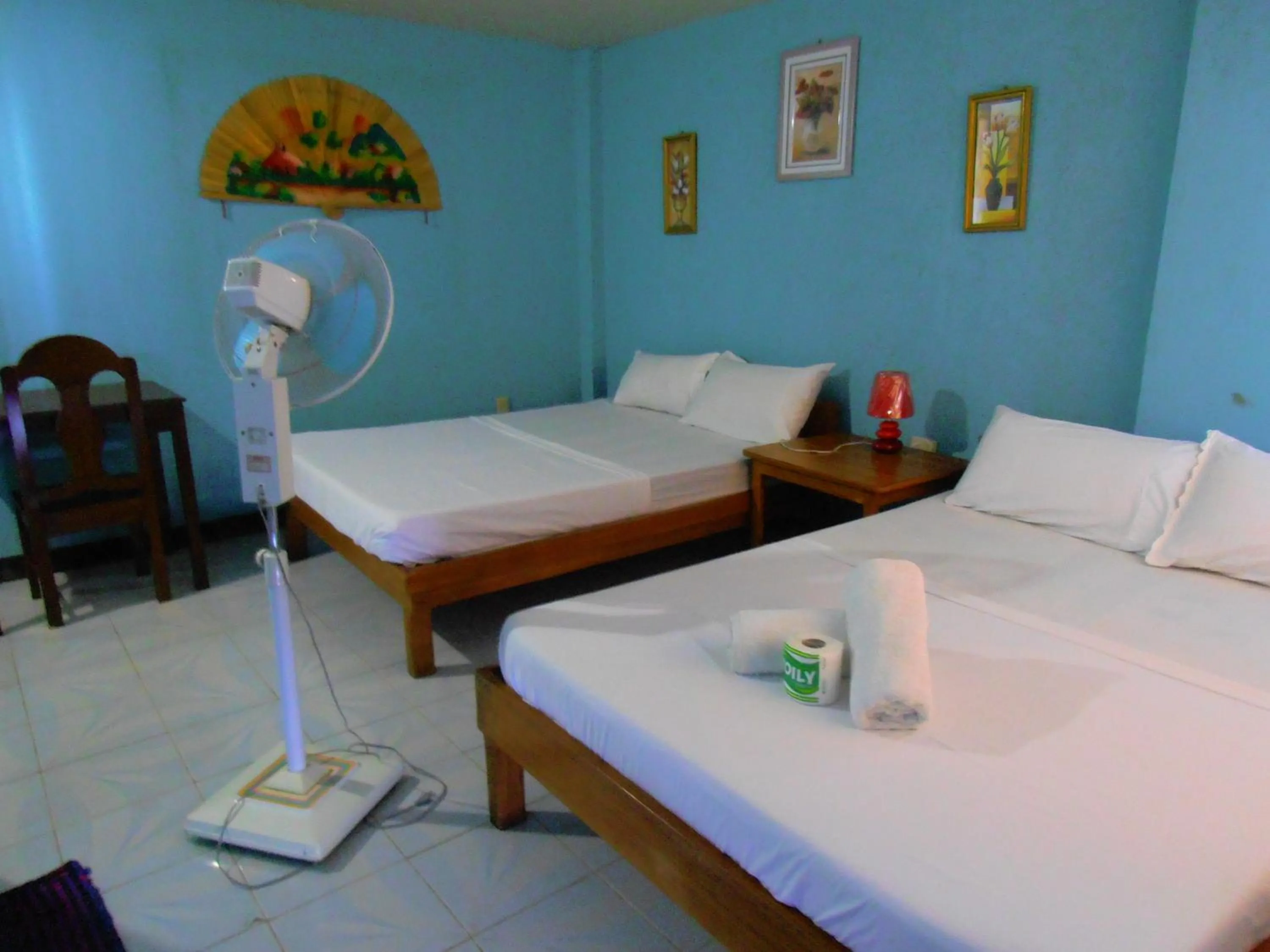 Photo of the whole room, Bed in Blue Corals Beach Resort