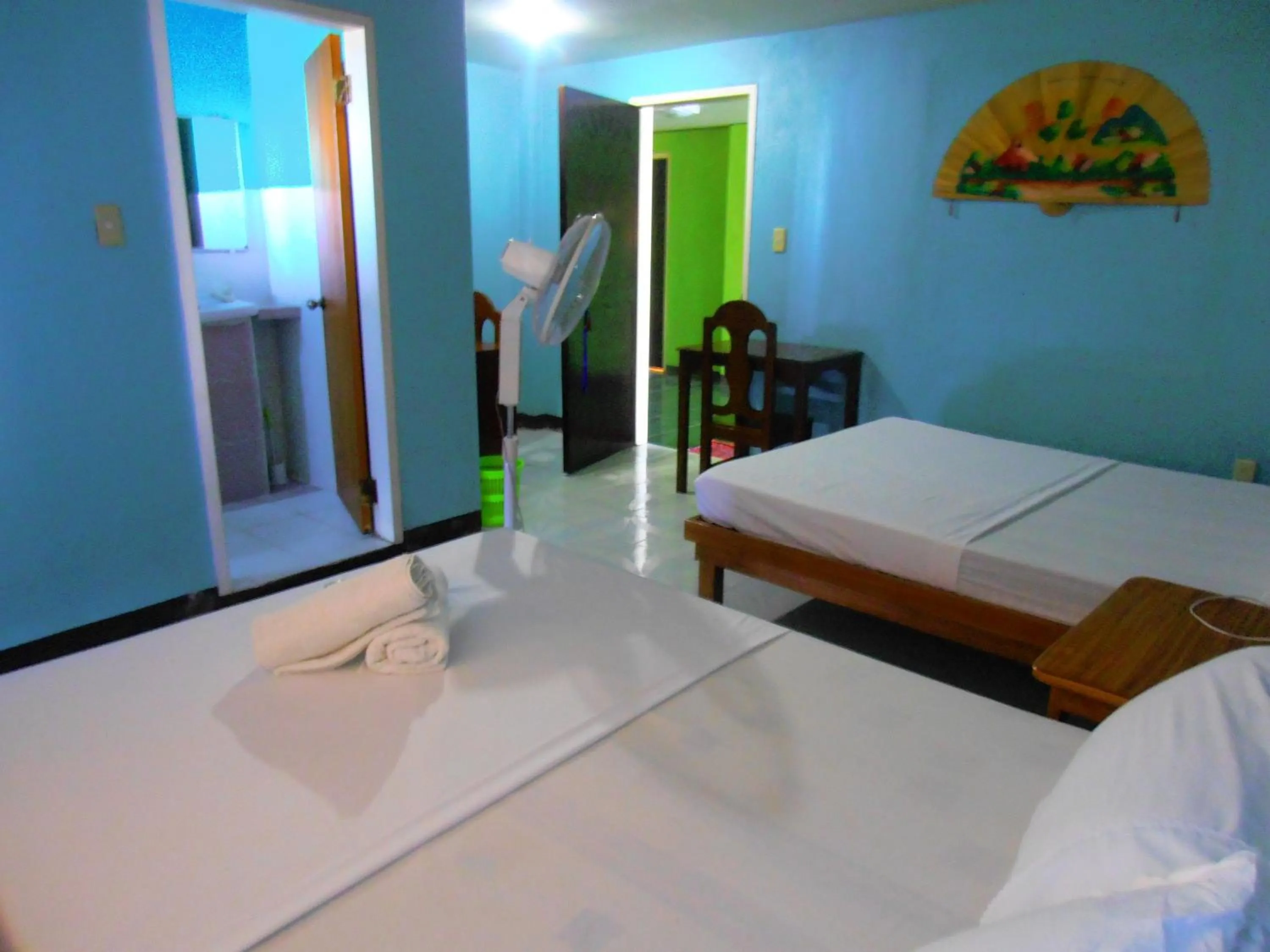 Photo of the whole room, Bed in Blue Corals Beach Resort