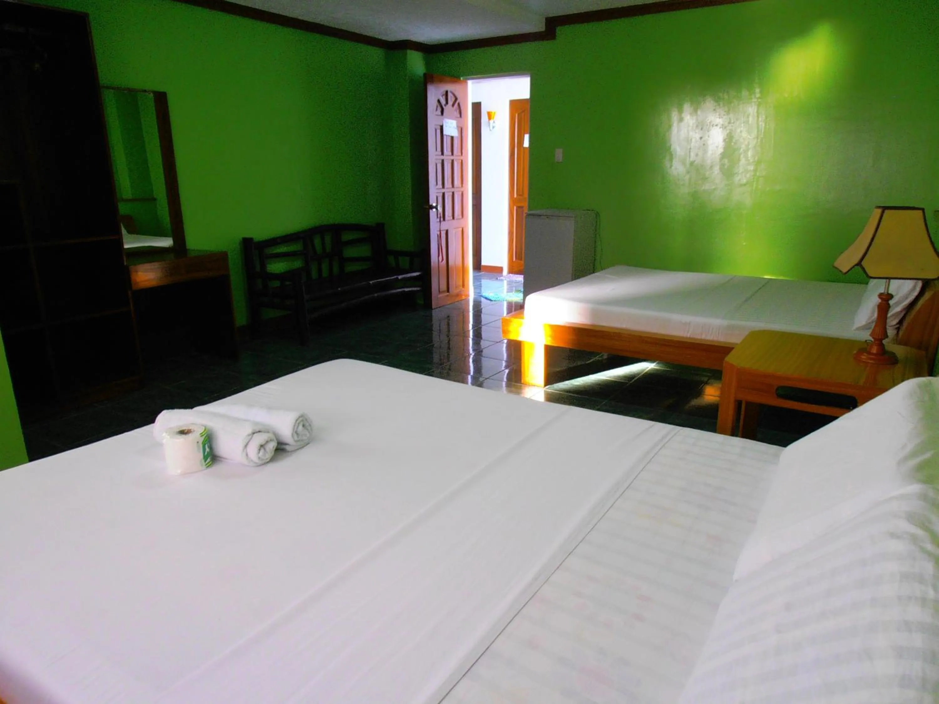 Photo of the whole room, Bed in Blue Corals Beach Resort