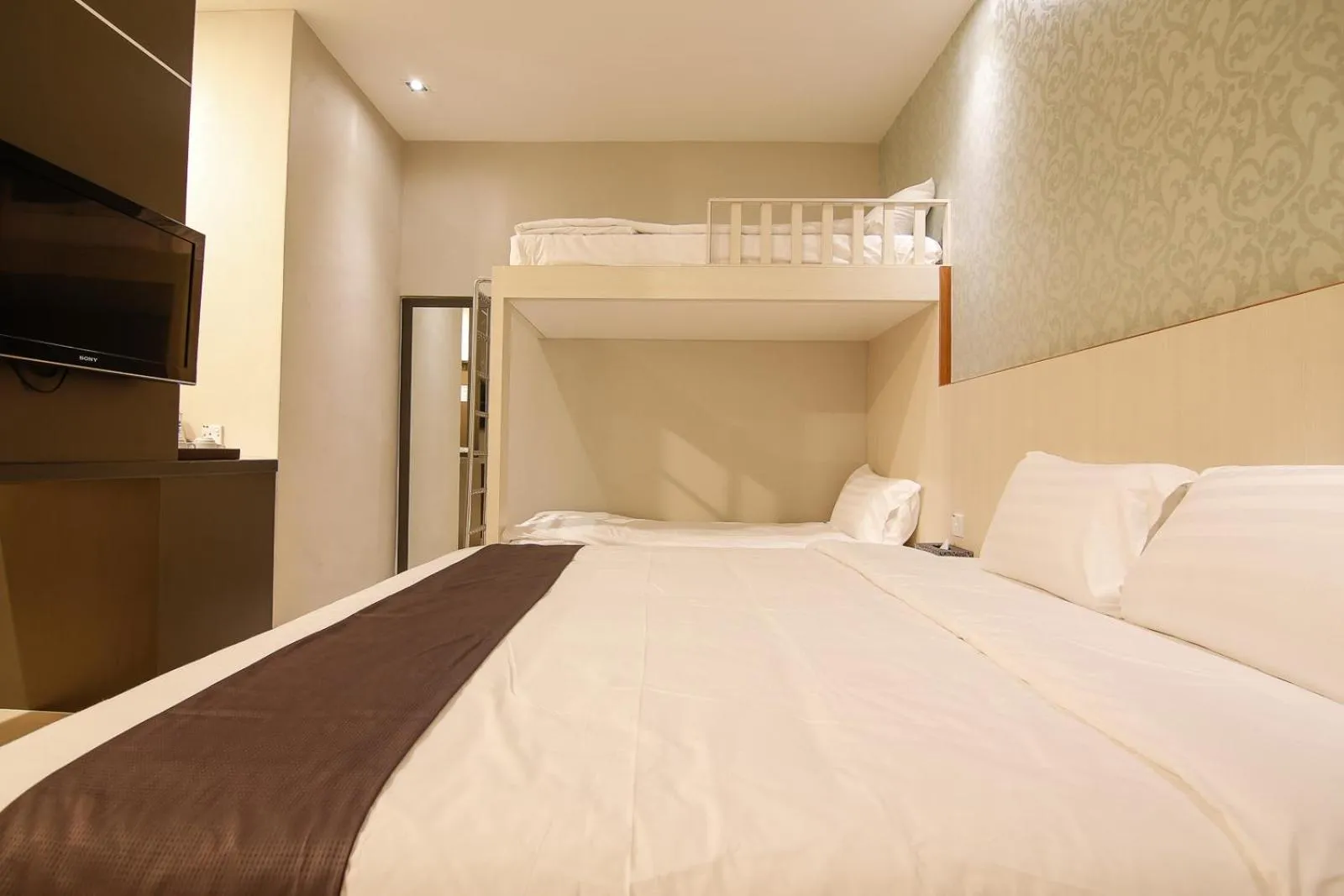 Bed in Art Cottage Hotel