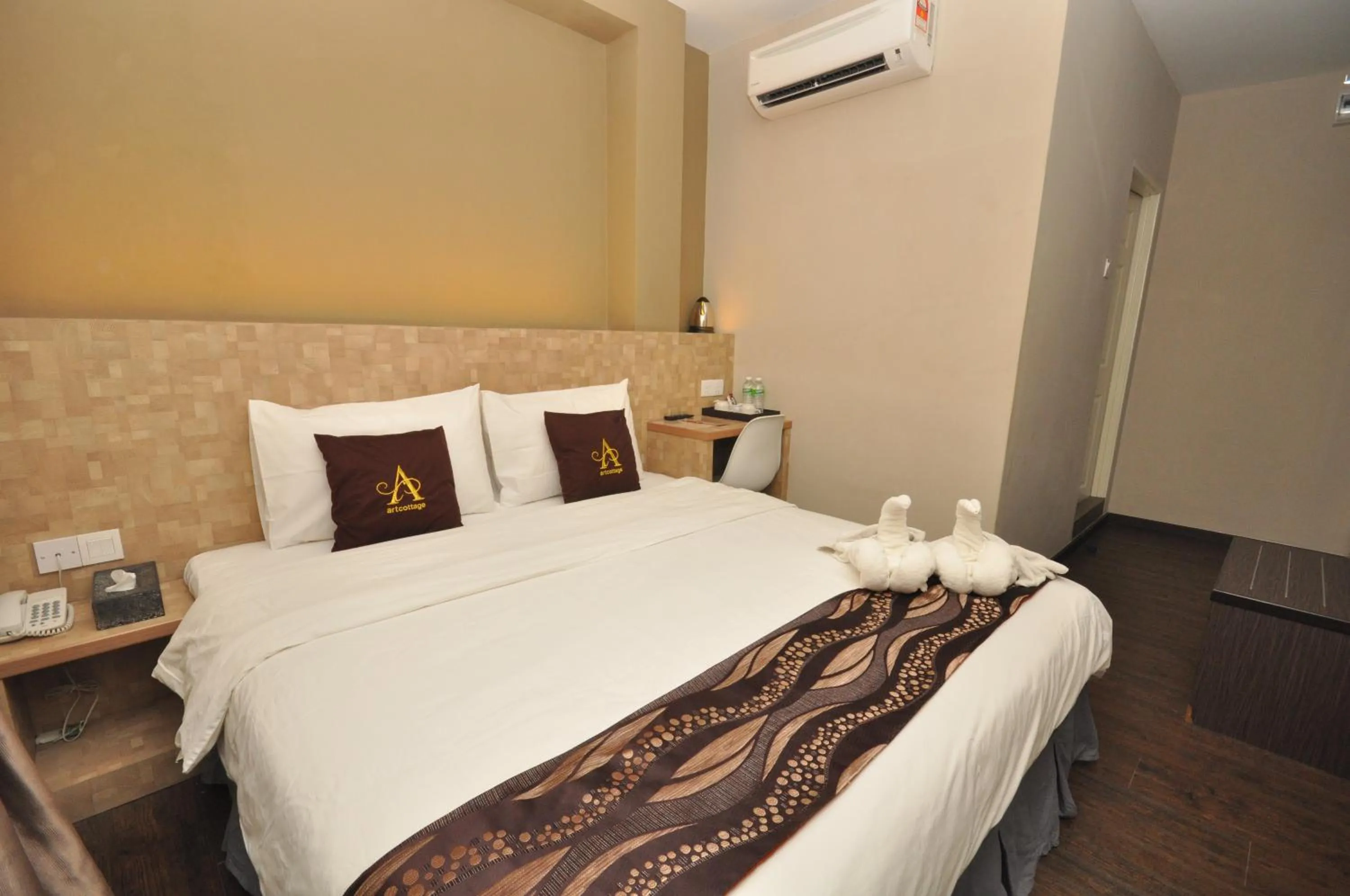 Bed in Art Cottage Hotel