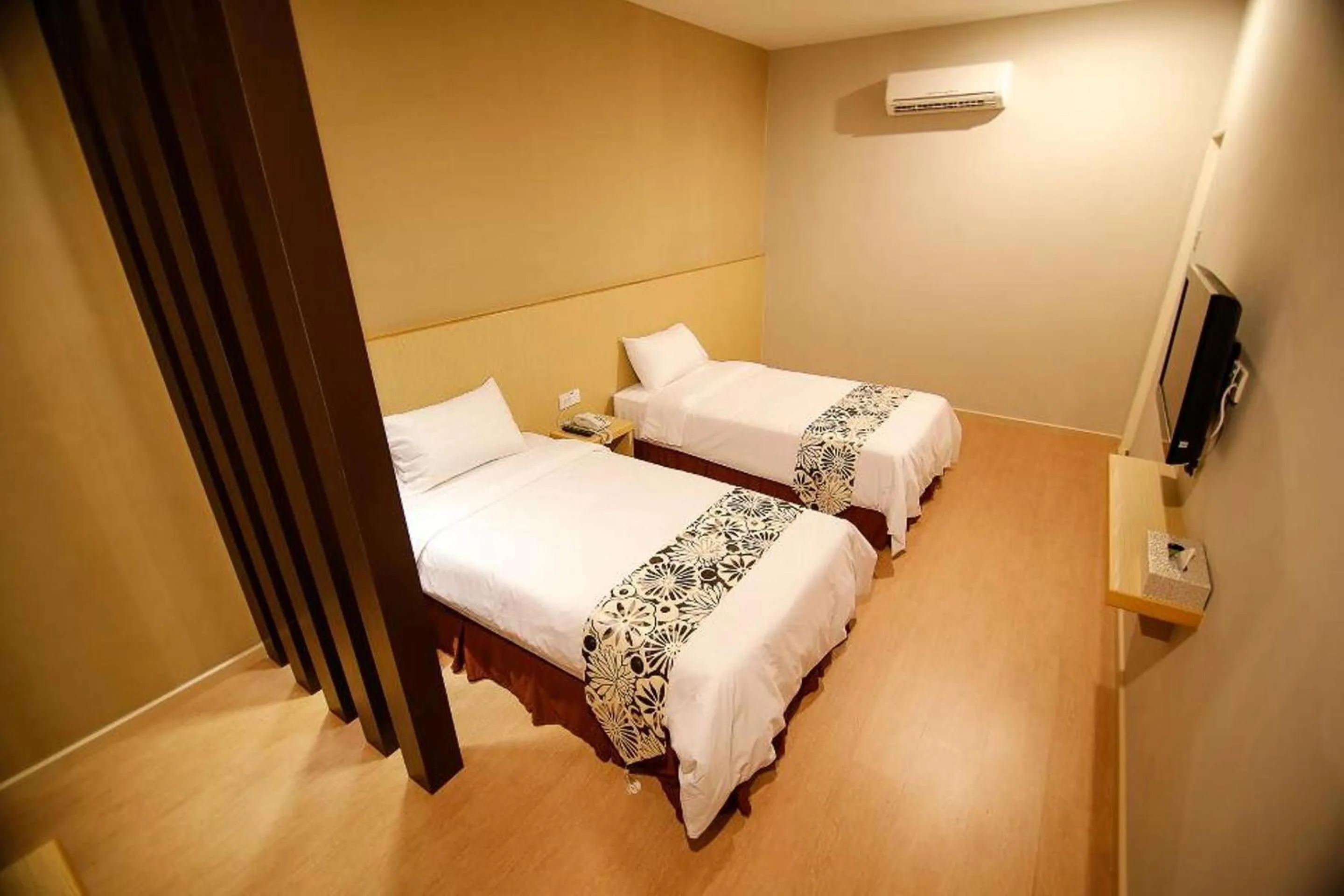 Bed in Art Cottage Hotel