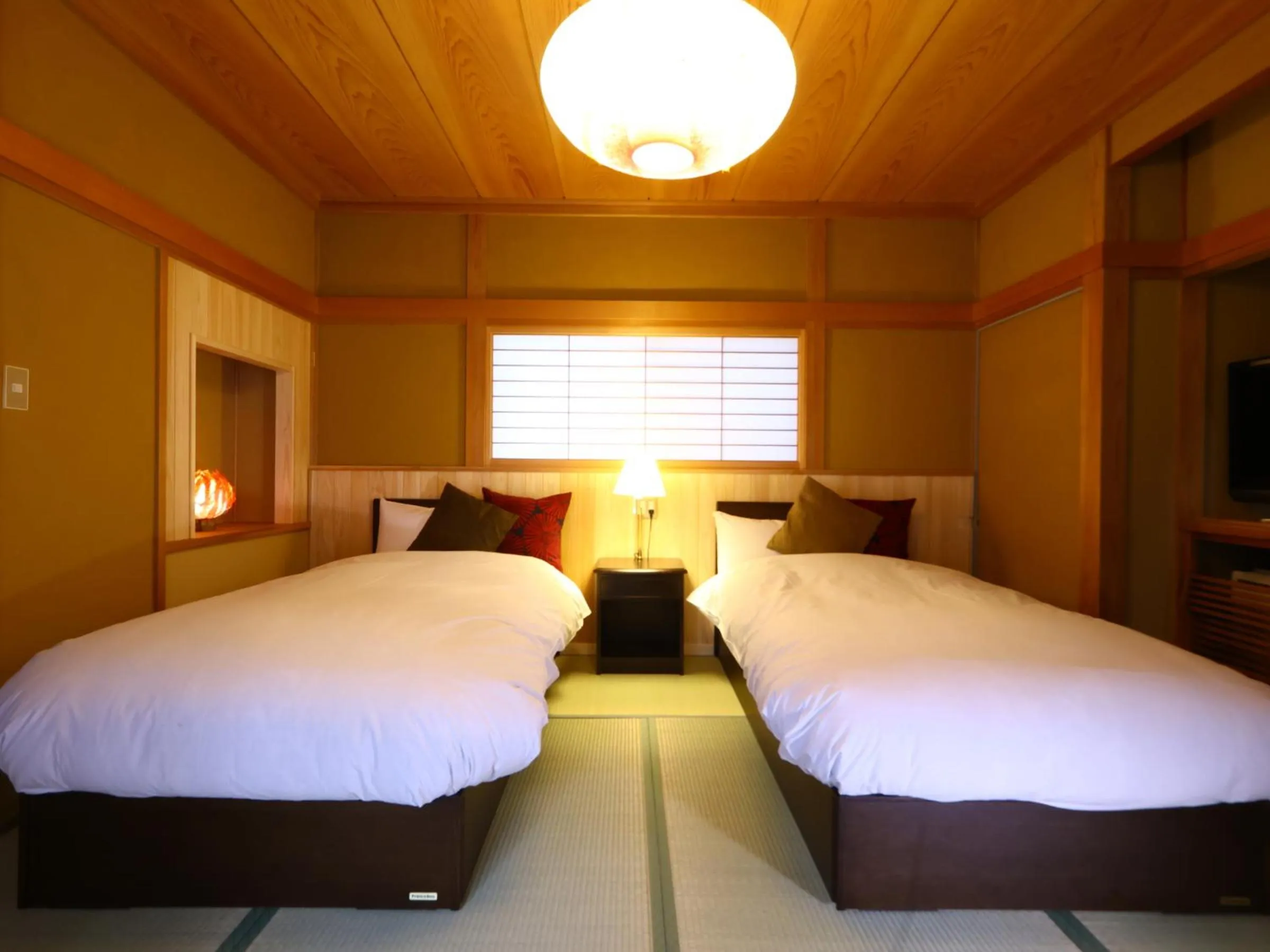 Photo of the whole room, Bed in Kamei no Yu