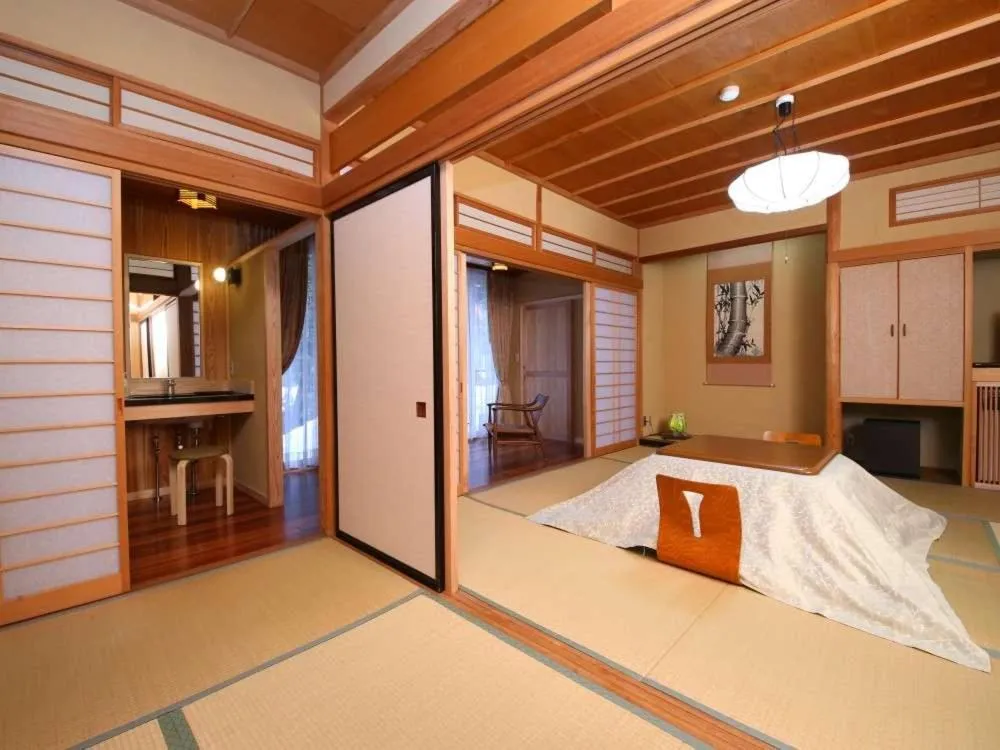 Photo of the whole room, Bed in Kamei no Yu