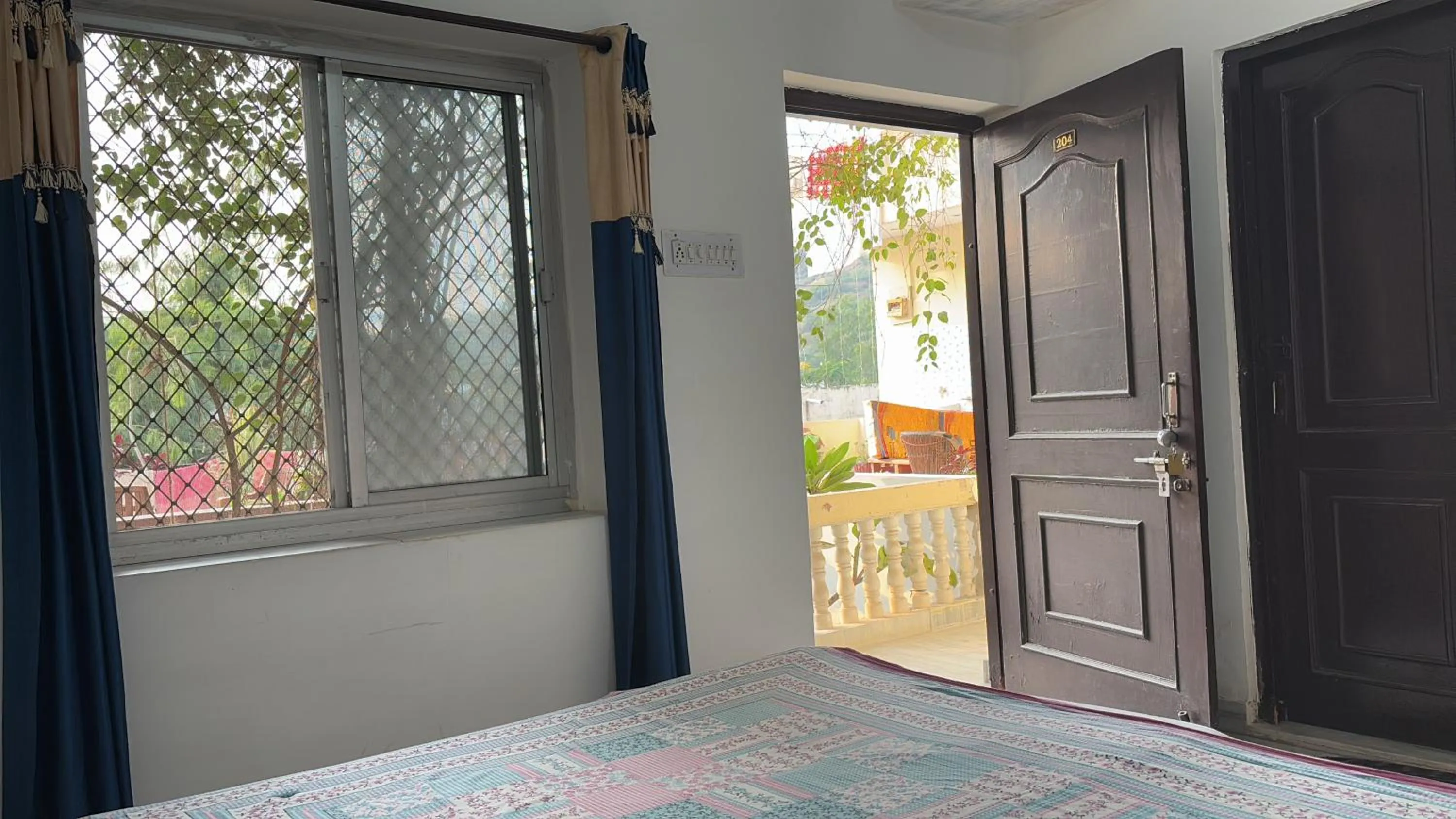 Bed in Keshav Palace -A Family Homestay