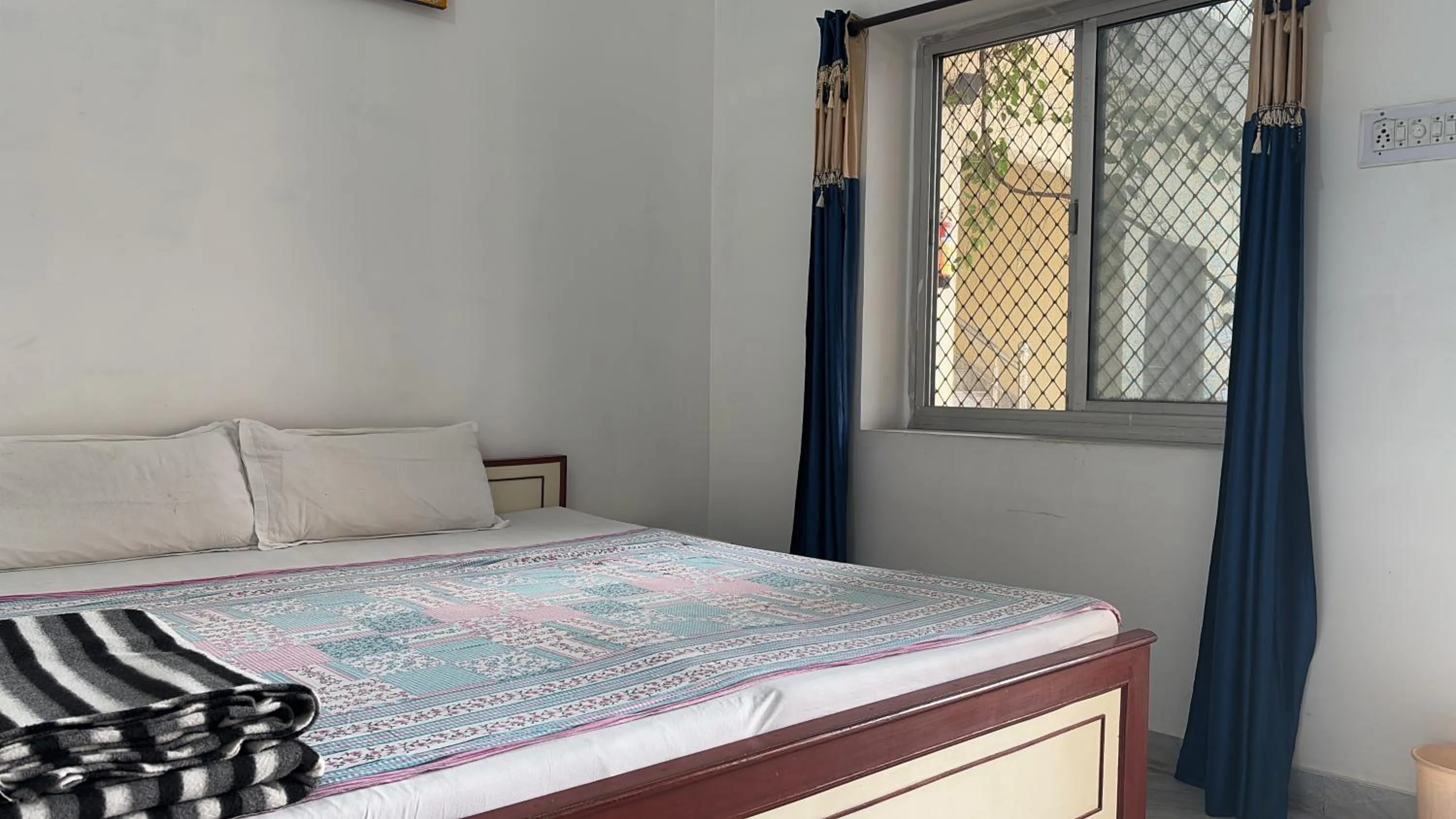 Bed in Keshav Palace -A Family Homestay