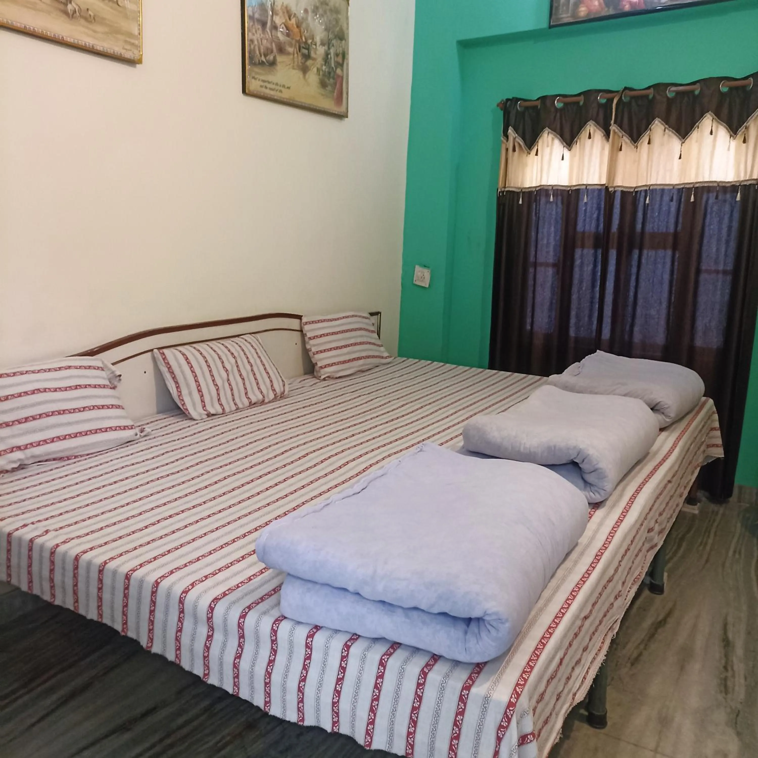 Bed in Keshav Palace -A Family Homestay