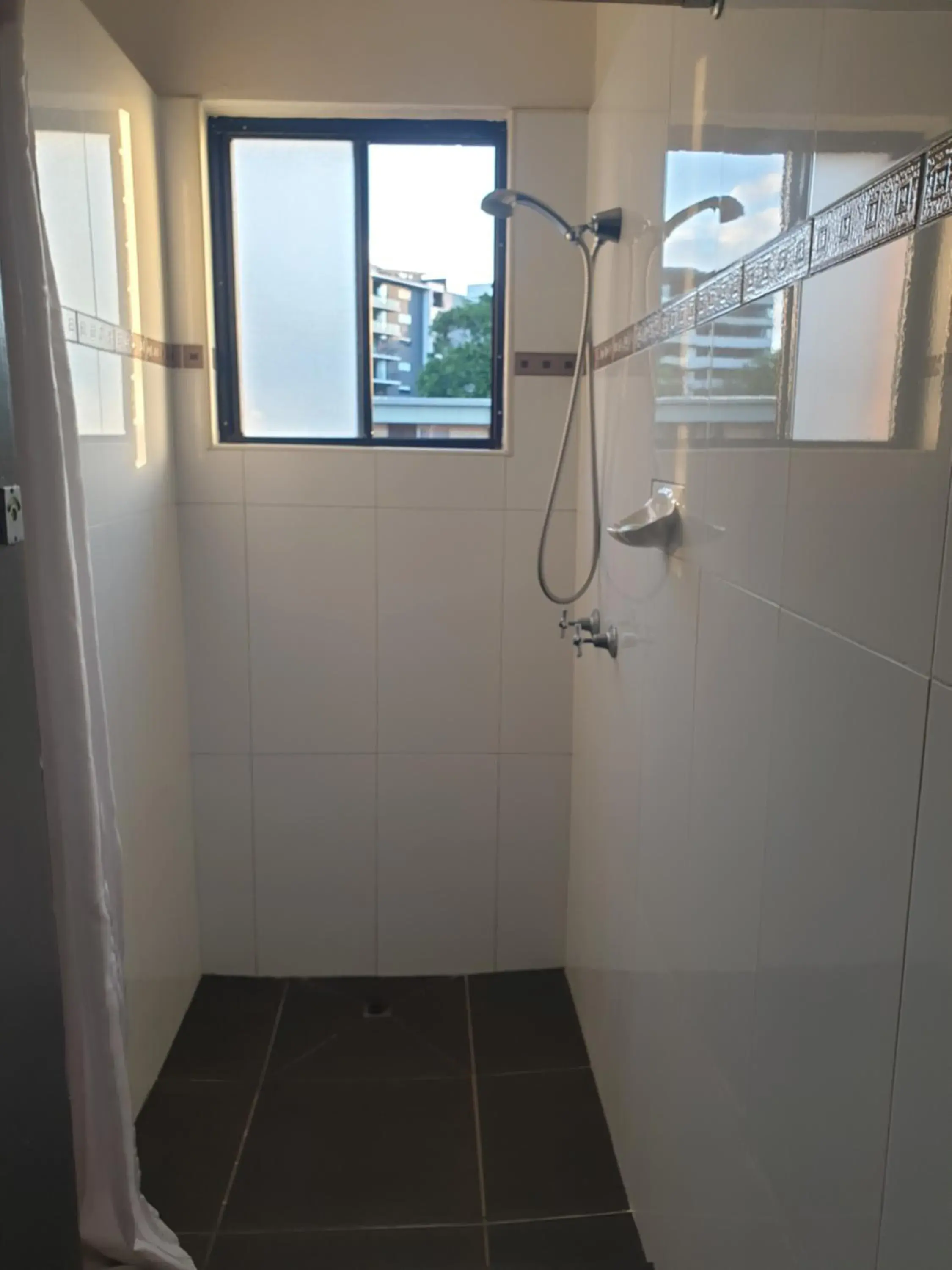 Budget Room with Shared Bathroom in Kingsford Riverside Inn Budget Room with Shared Bathroom in Kingsford Riverside Inn