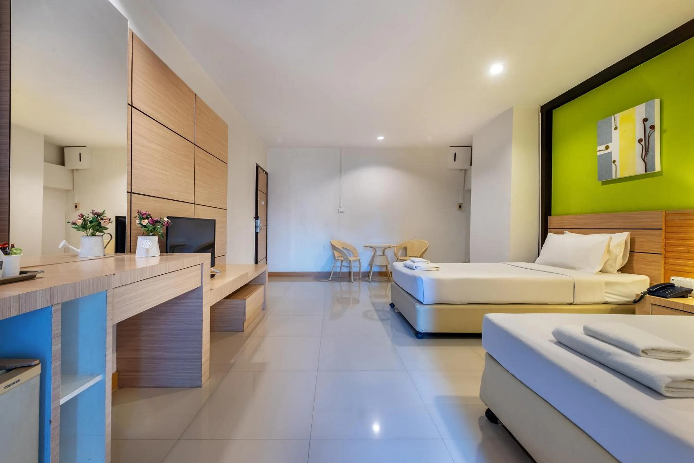 Bed in The Legacy Convention Hotel