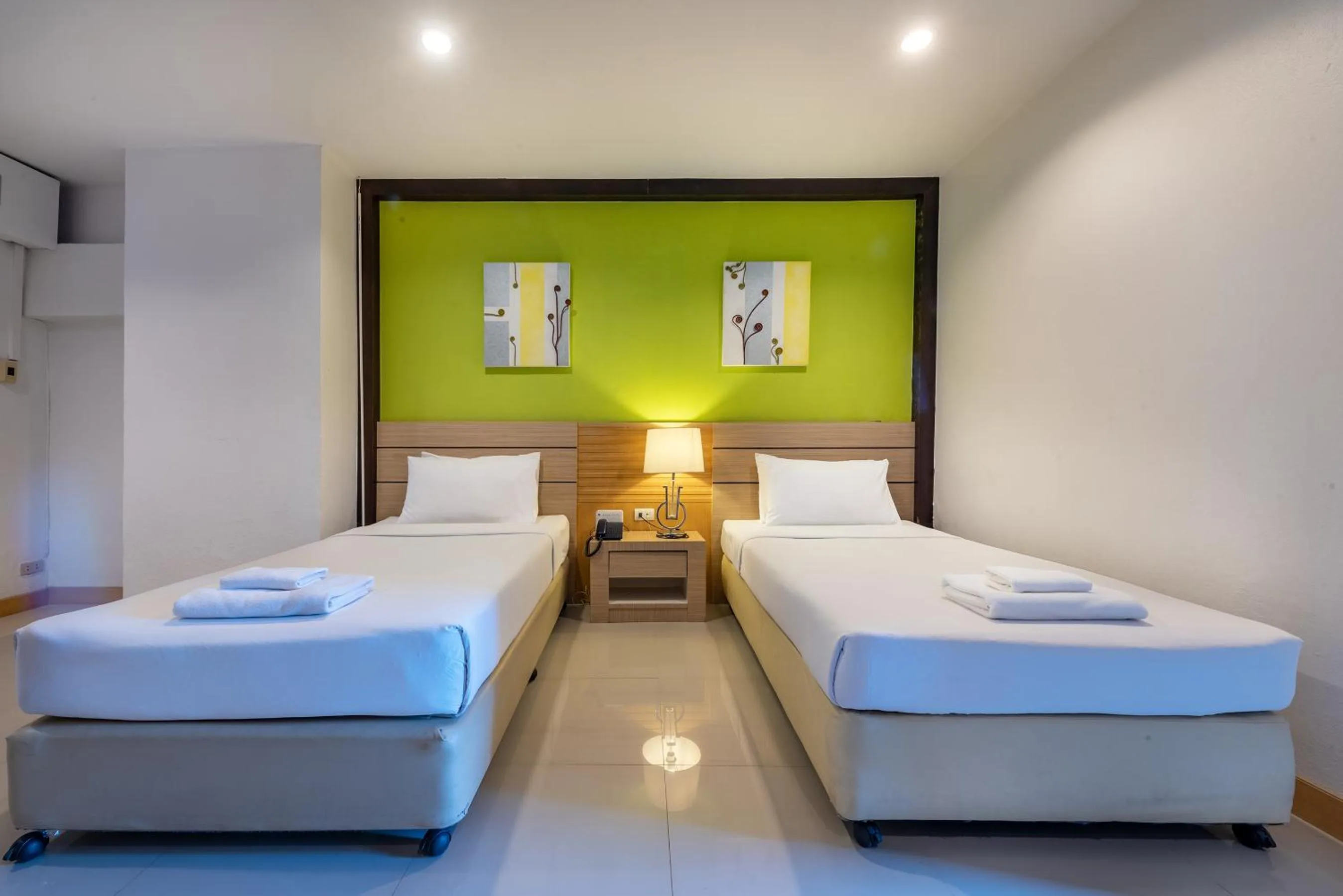 Bed in The Legacy Convention Hotel